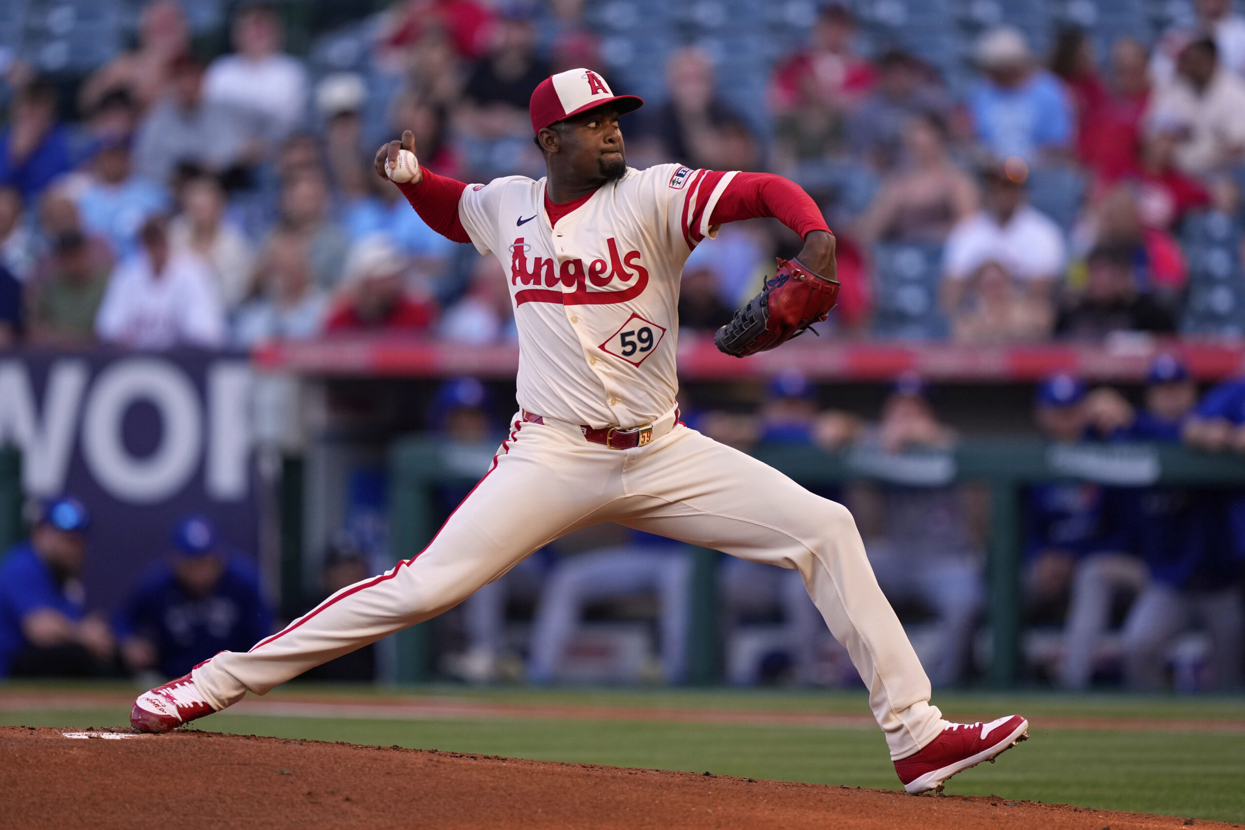 Angels starting pitcher Jose Soriano throws to the plate during...