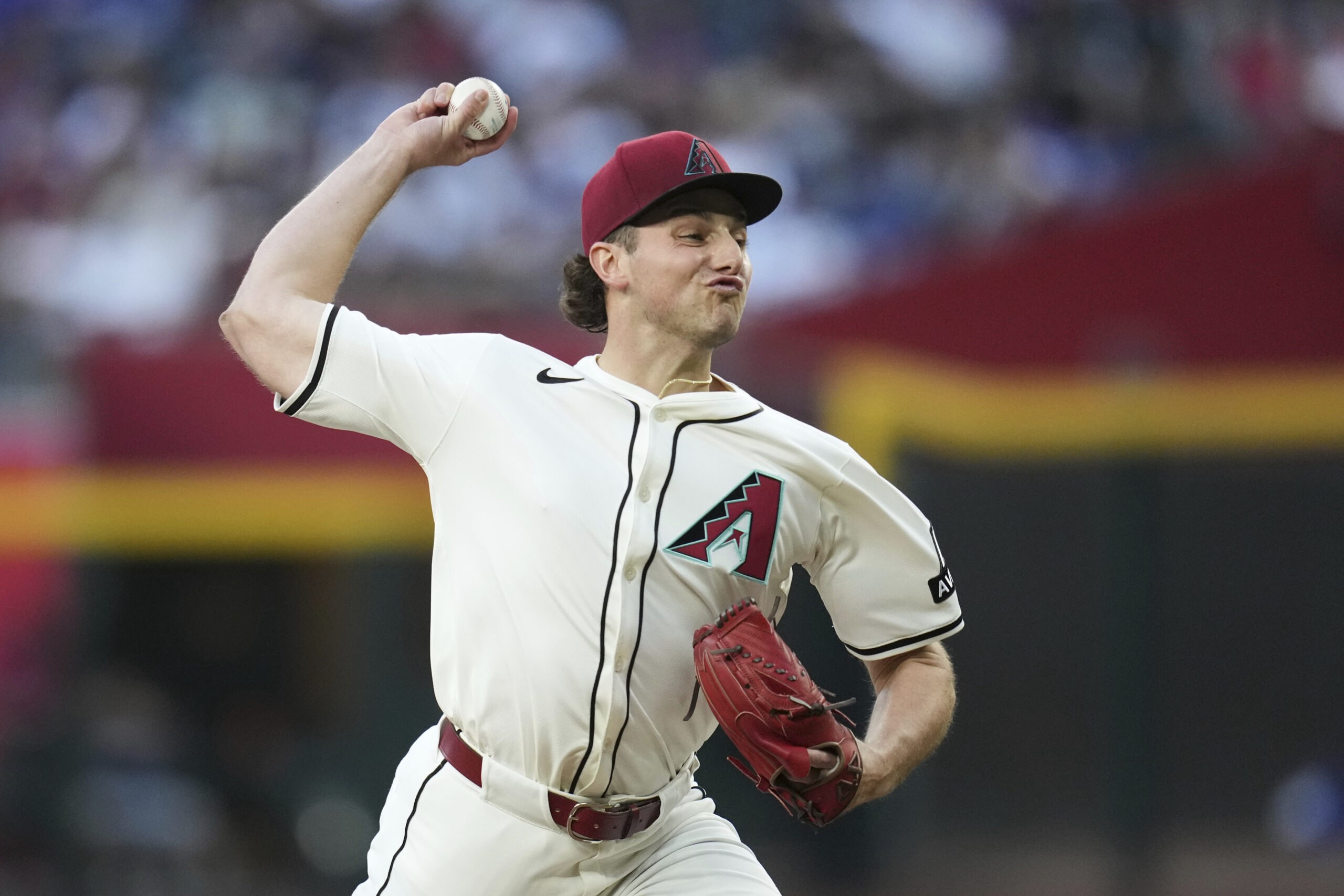 Arizona Diamondbacks starting pitcher Brandon Pfaadt throws to the plate...