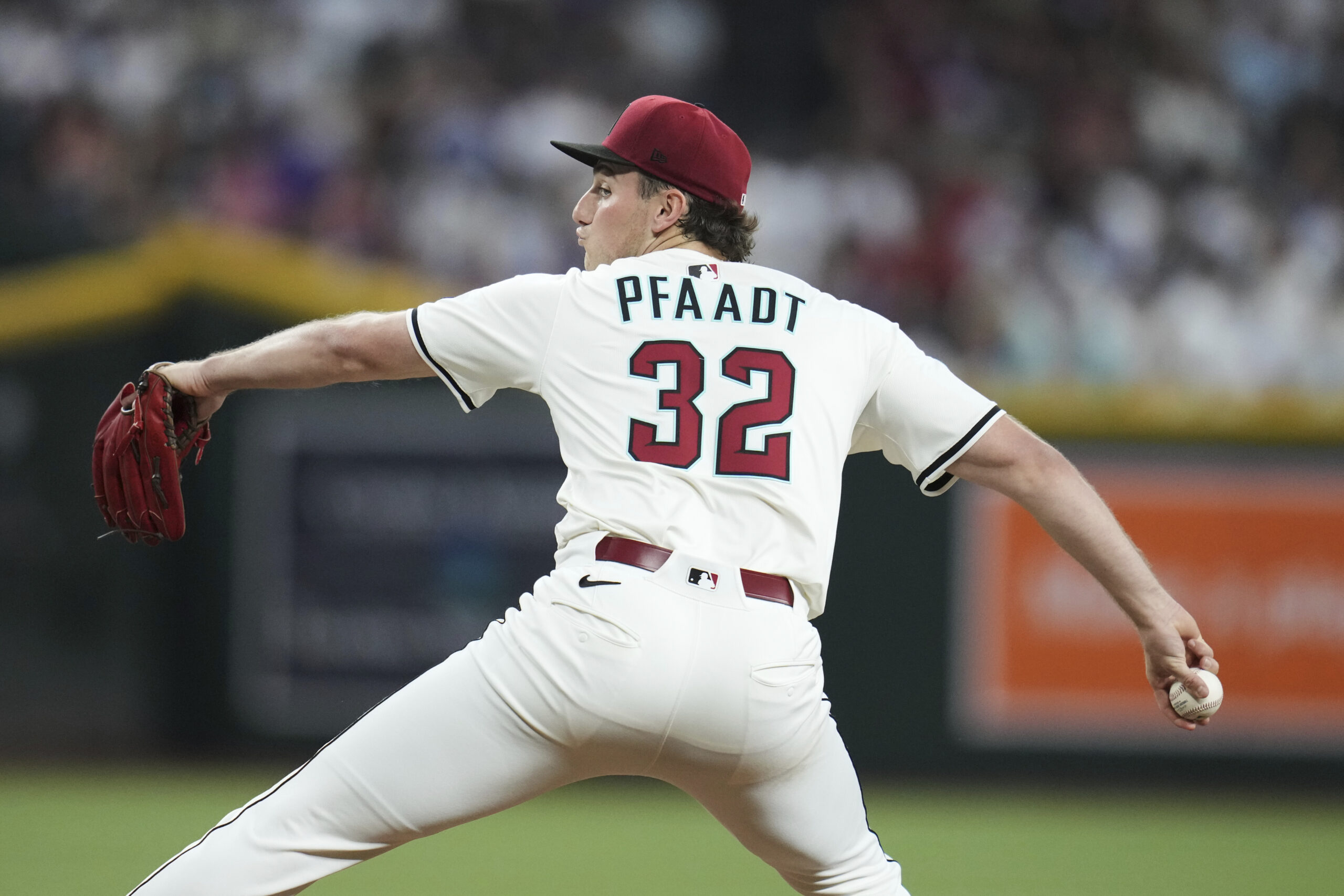 Arizona Diamondbacks starting pitcher Brandon Pfaadt throws to the plate...