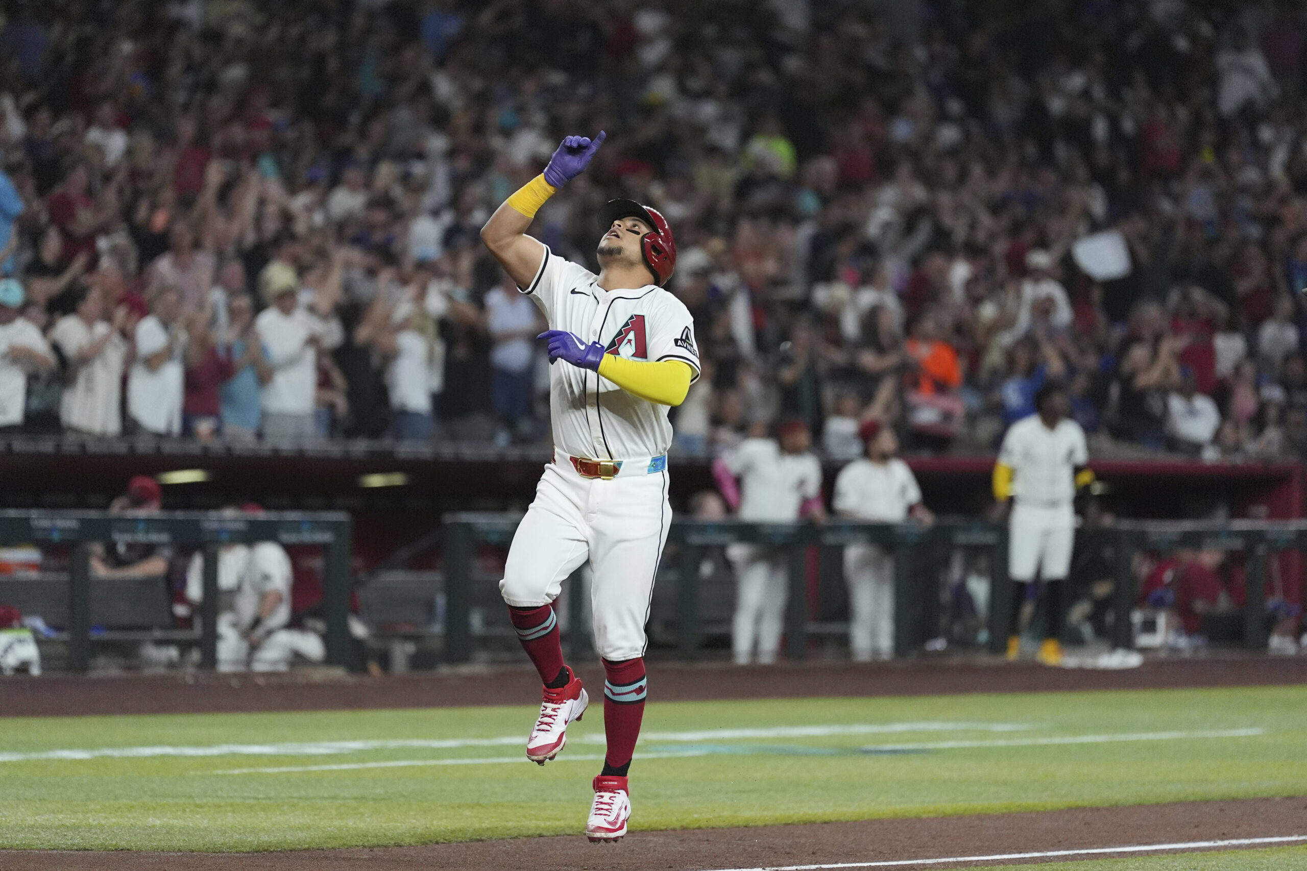 The Arizona Diamondbacks’ Gabriel Moreno celebrates as he runs the...