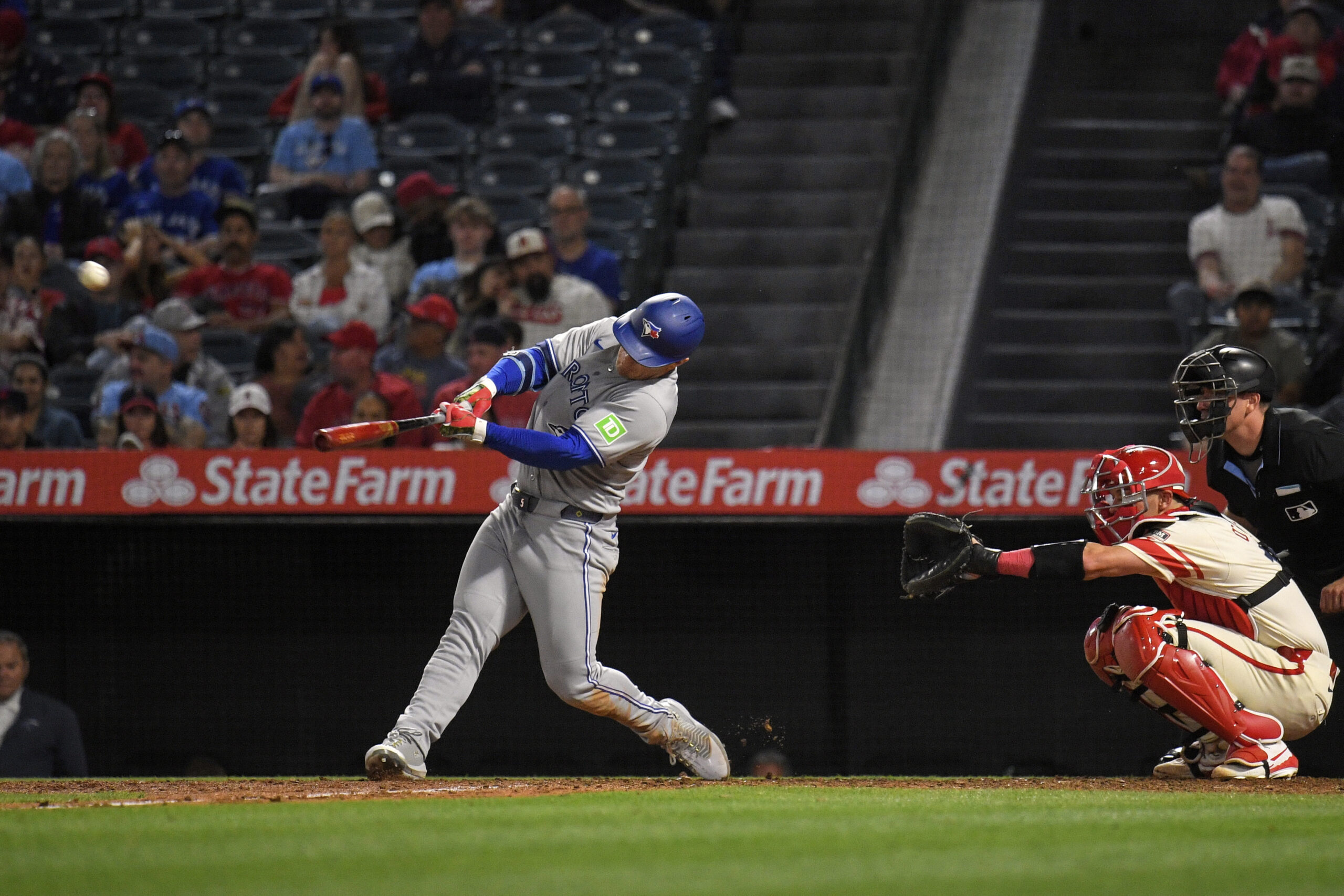 The Toronto Blue Jays’ Daulton Varsho hits a solo home...