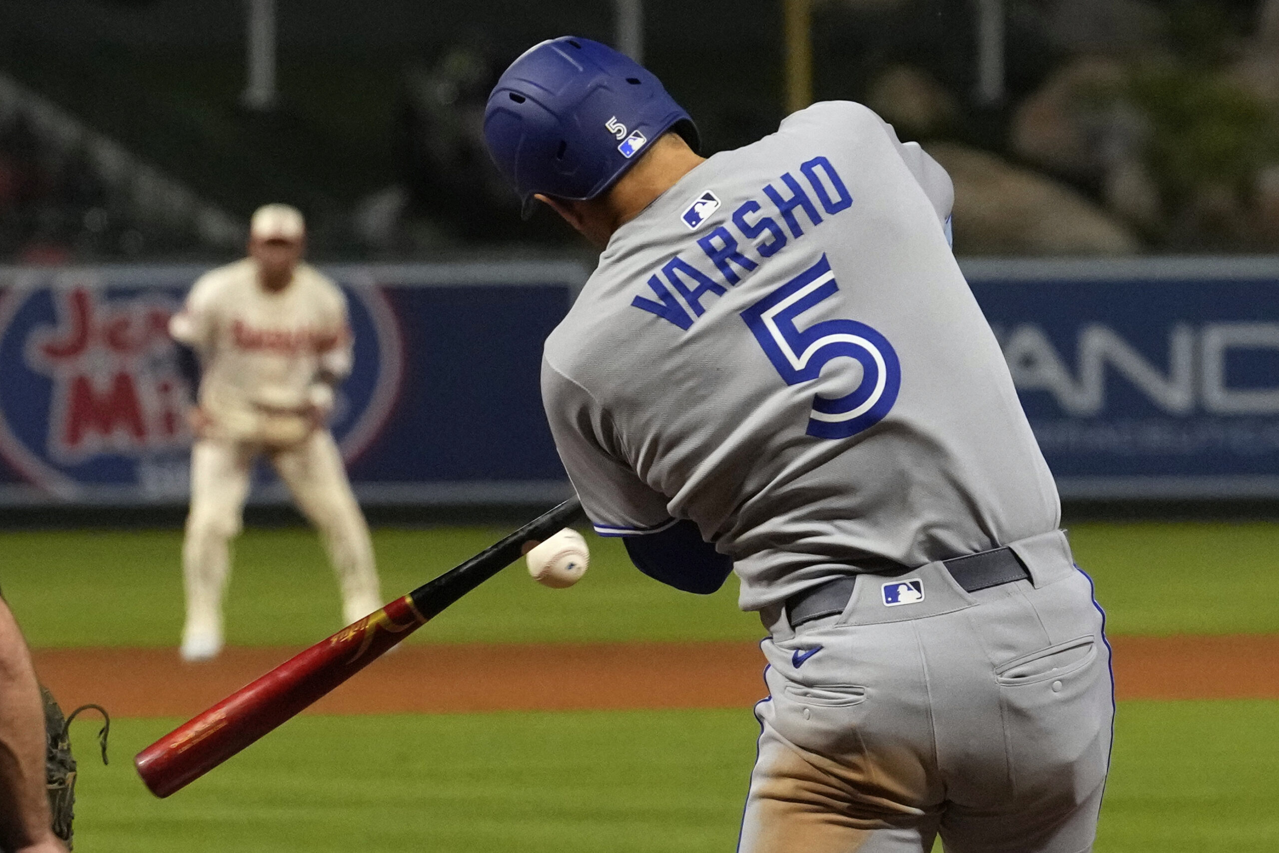 The Toronto Blue Jays’ Daulton Varsho hits a solo home...
