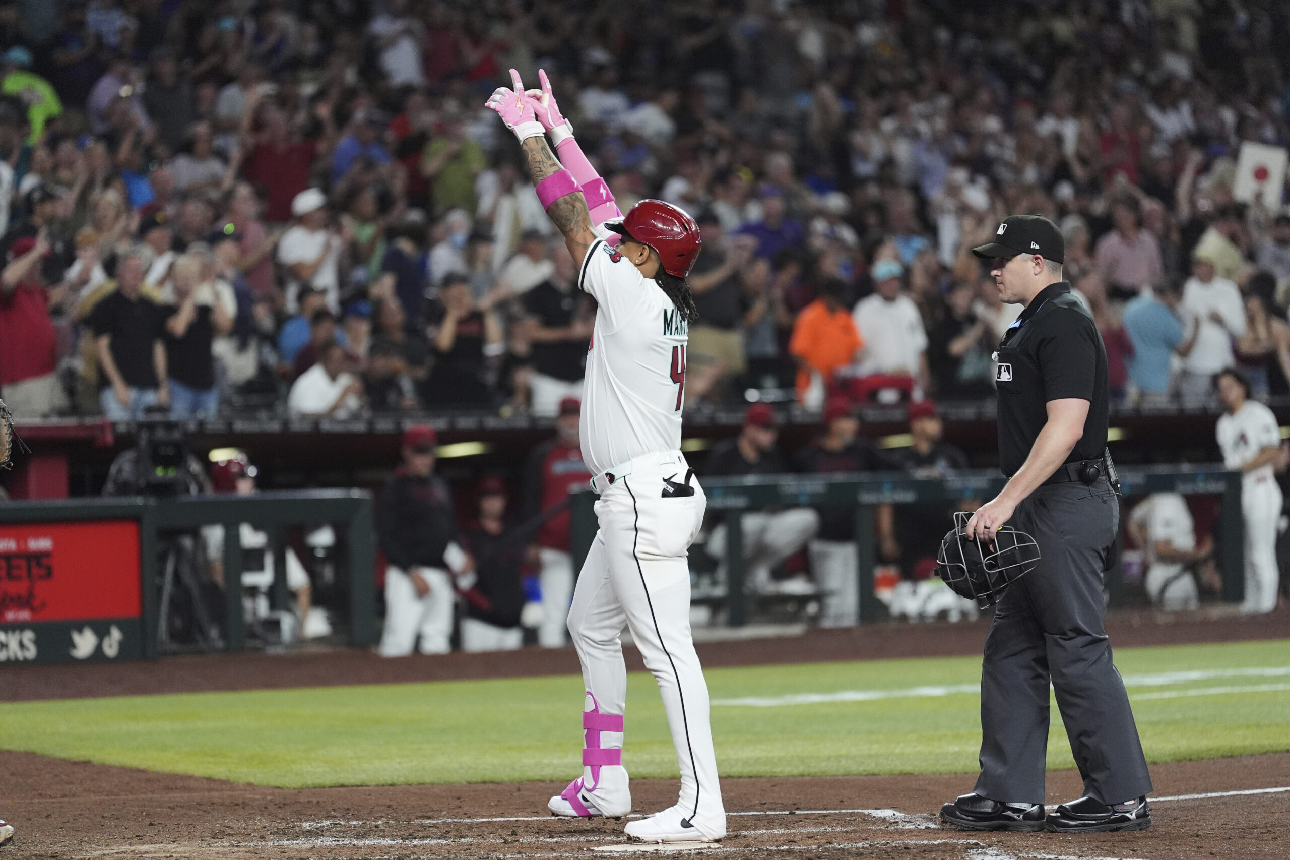 The Arizona Diamondbacks’ Ketel Marte celebrates after hitting a solo...