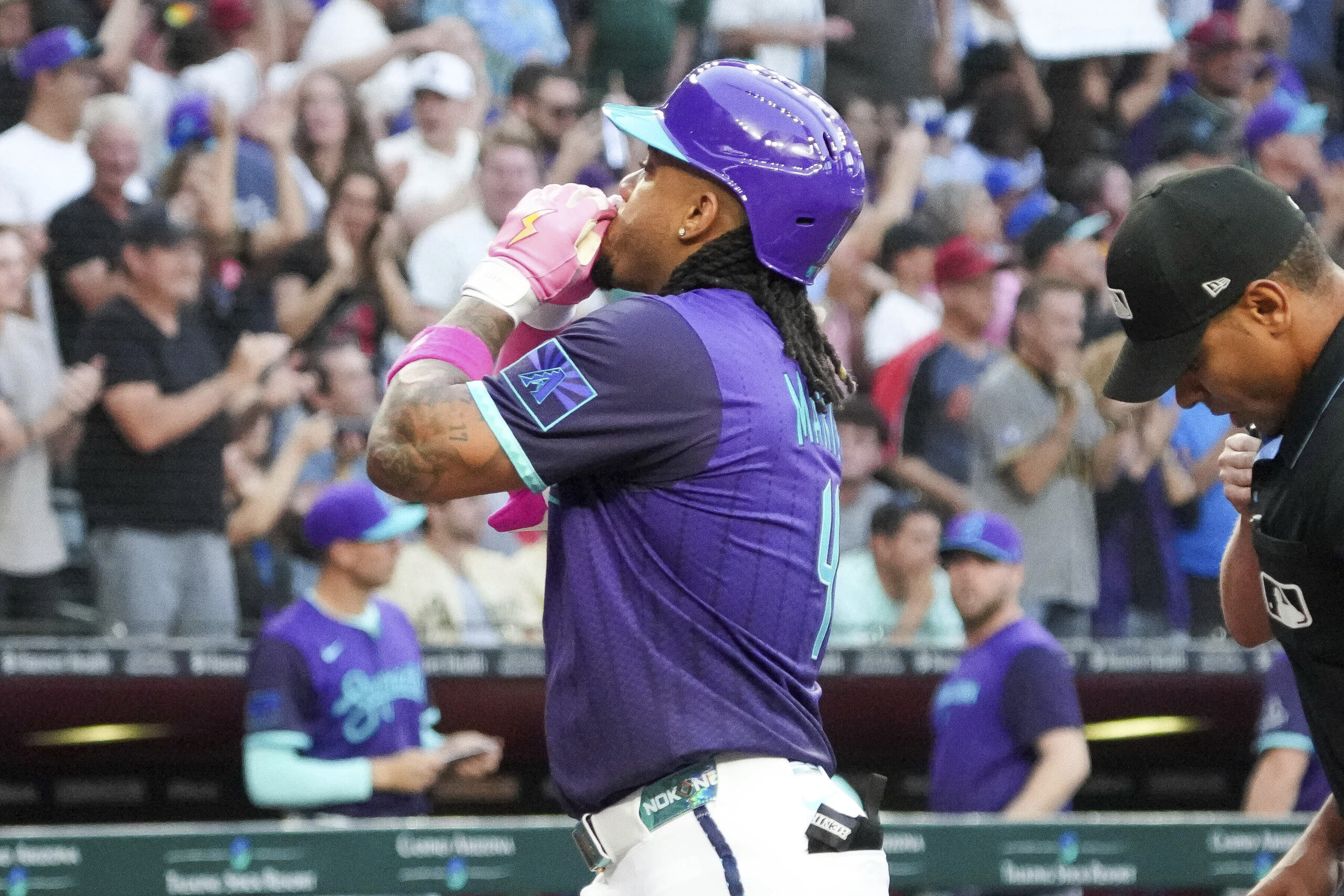 The Arizona Diamondbacks’ Ketel Marte blows kisses after his home...