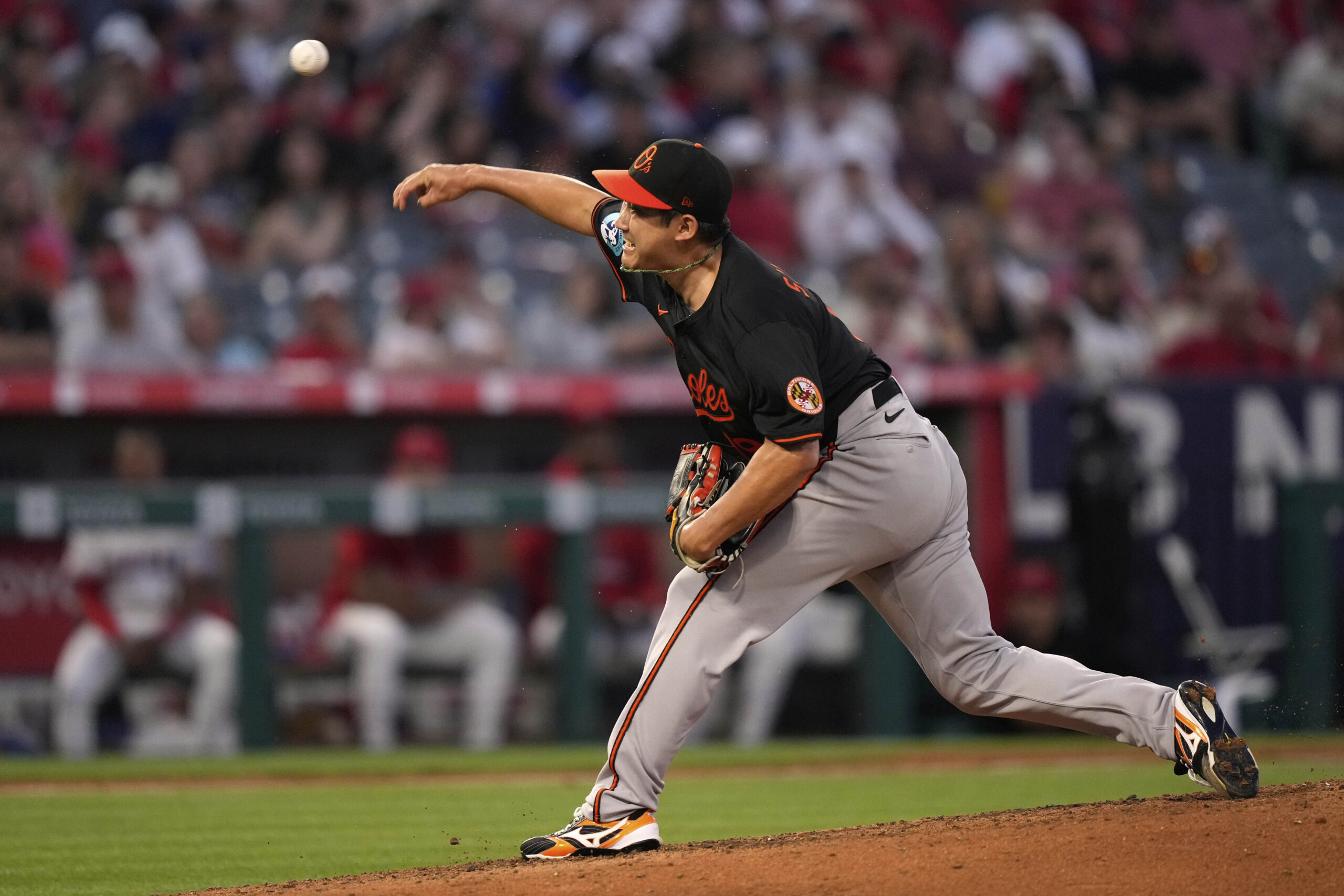 Baltimore Orioles starting pitcher Tomoyuki Sugano throws to the plate...