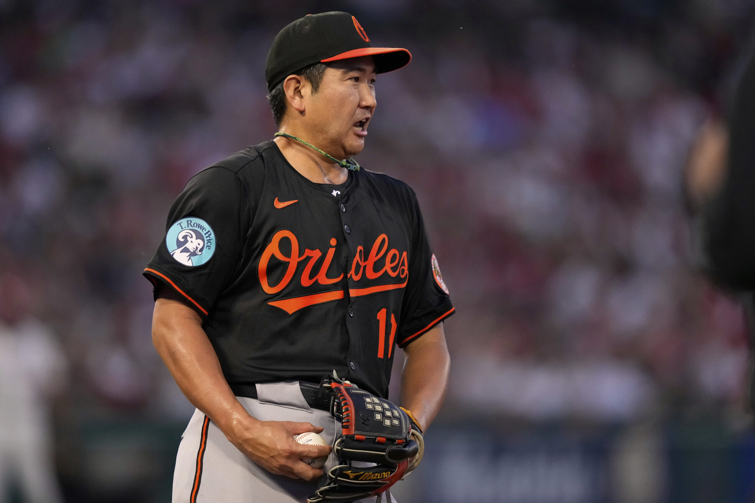 Baltimore Orioles starting pitcher Tomoyuki Sugano celebrates after forcing the...