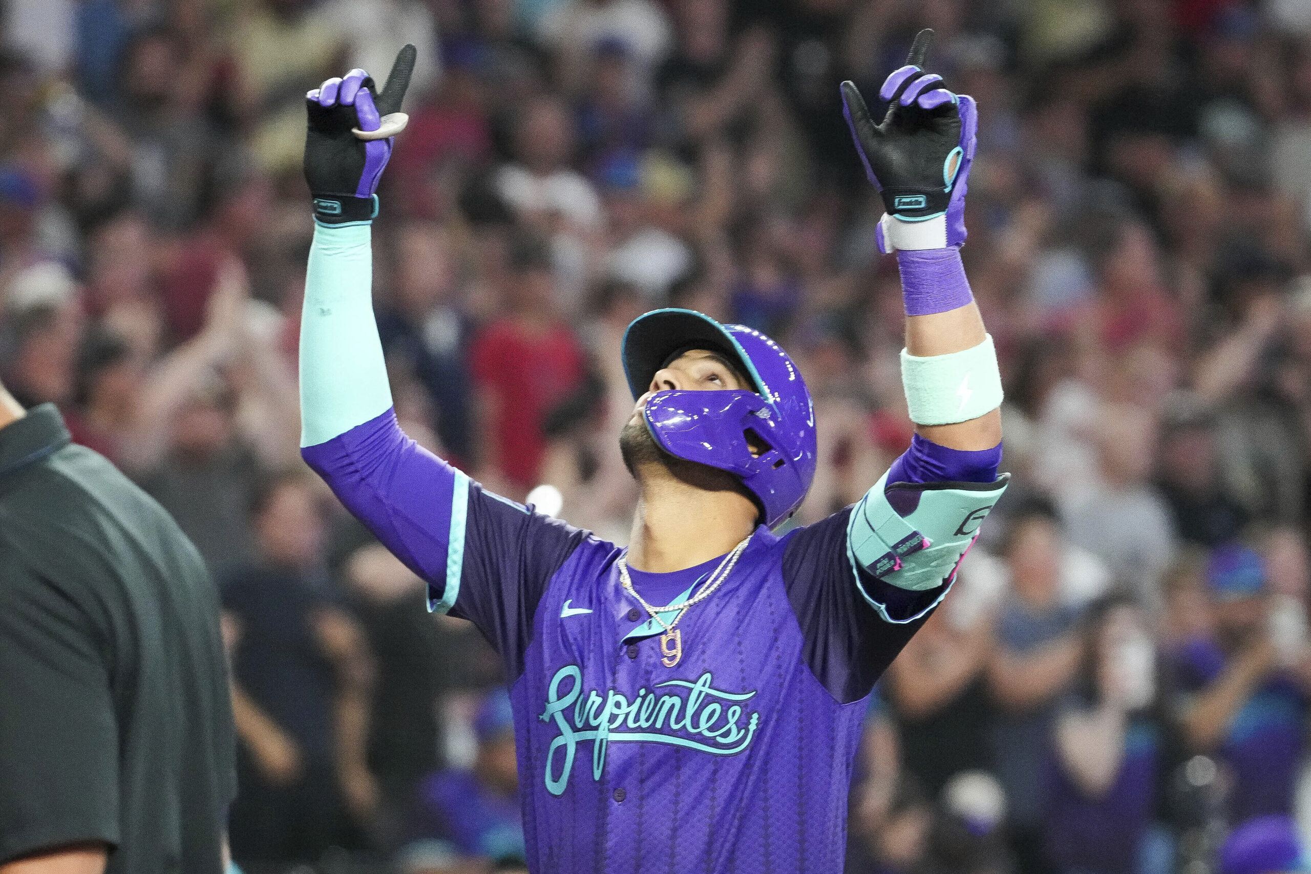The Arizona Diamondbacks’ Lourdes Gurriel Jr. points to the sky...