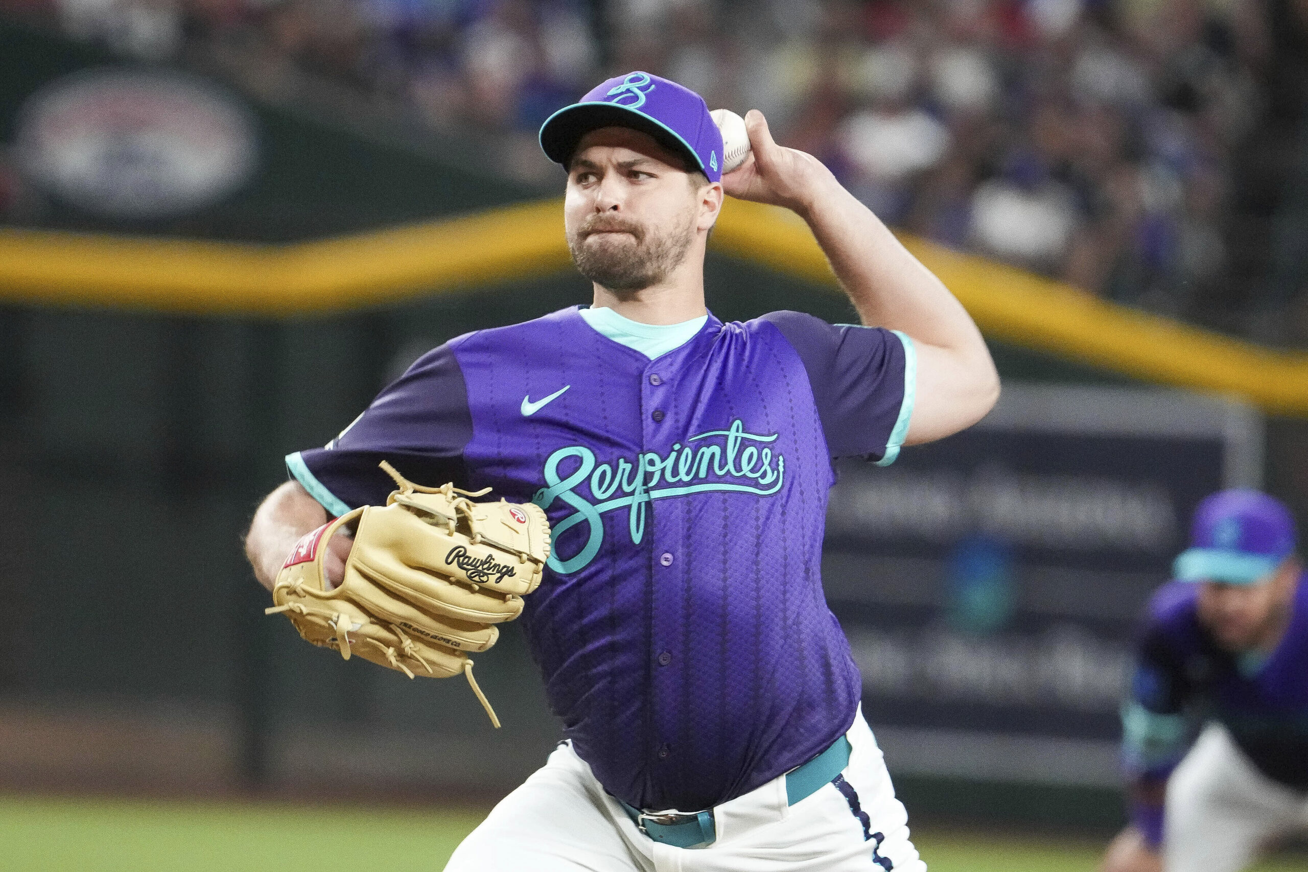 Arizona Diamondbacks relief pitcher Jalen Beeks throws to the plate...