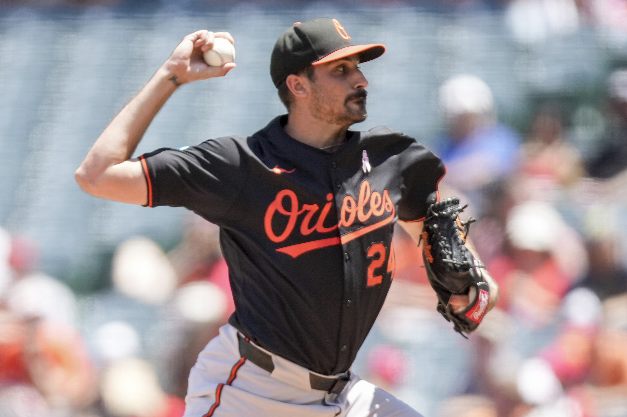 Baltimore Orioles starting pitcher Zach Eflin delivers during the first...