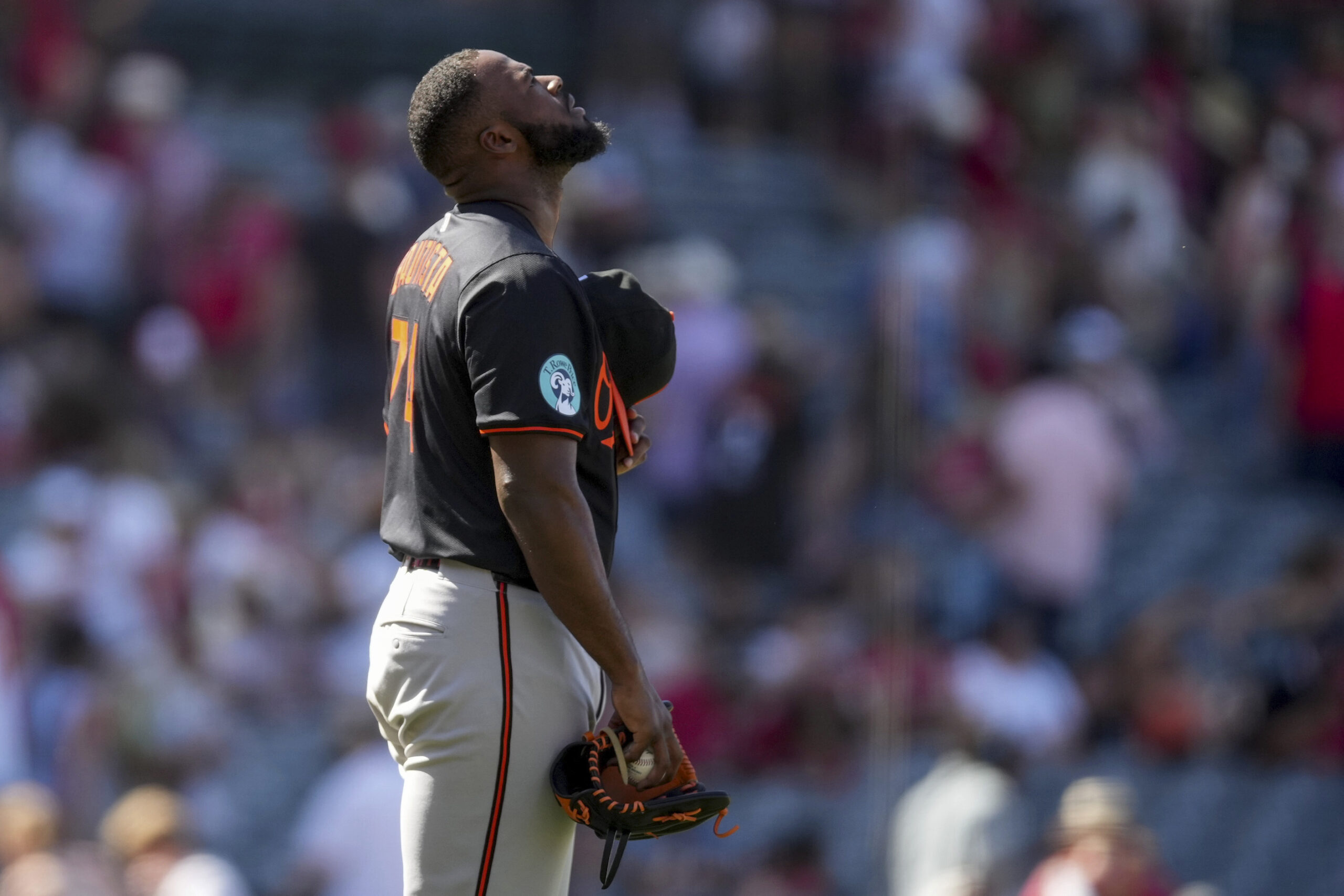 Baltimore Orioles relief pitcher Félix Bautista reacts after a baseball...