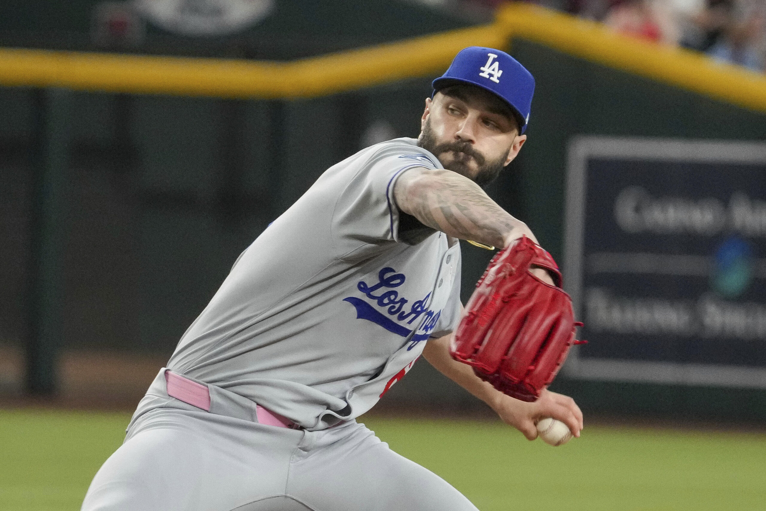 Dodgers pitcher Tanner Scott throws against the Arizona Diamondbacks during...