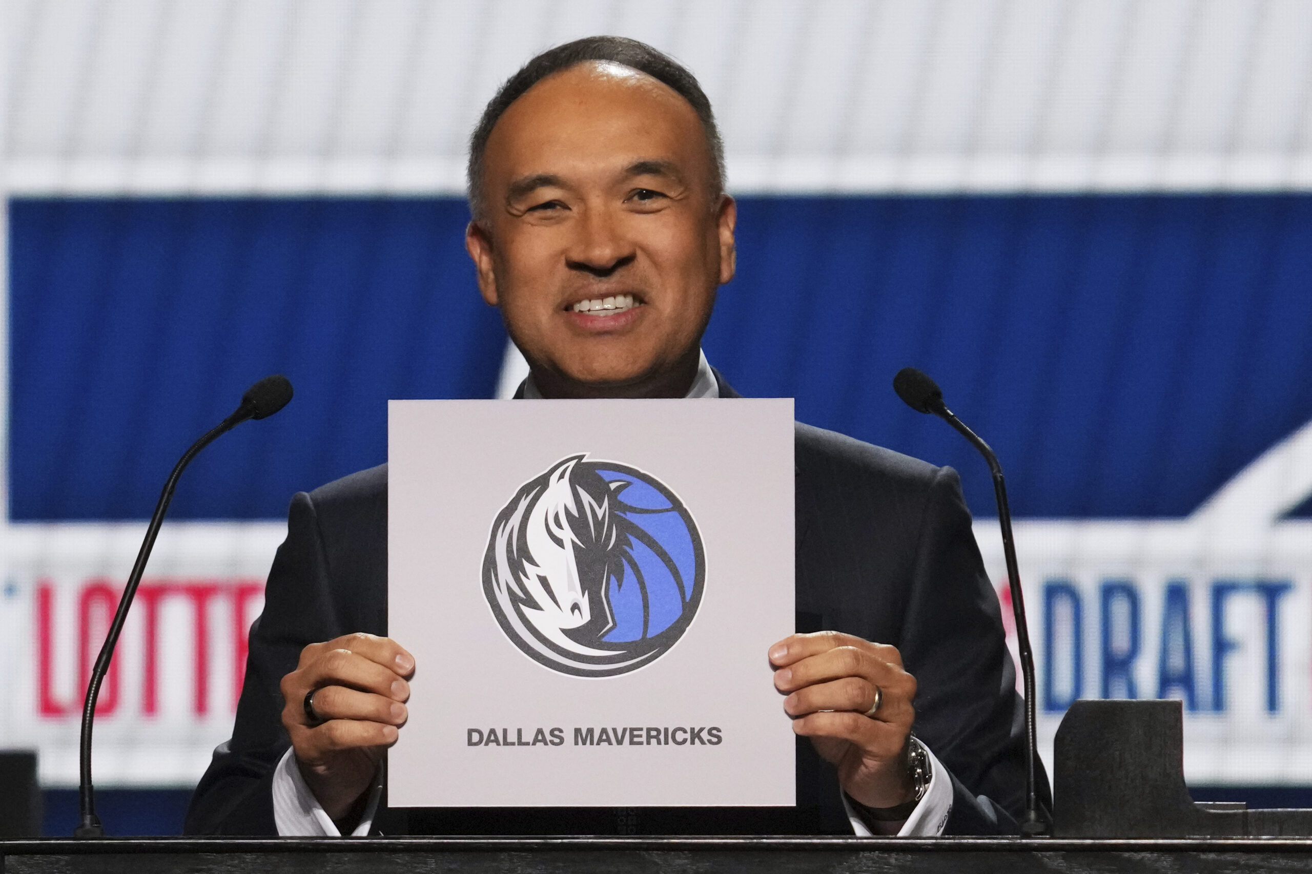 NBA deputy commissioner Mark Tatum announces that the Dallas Mavericks...