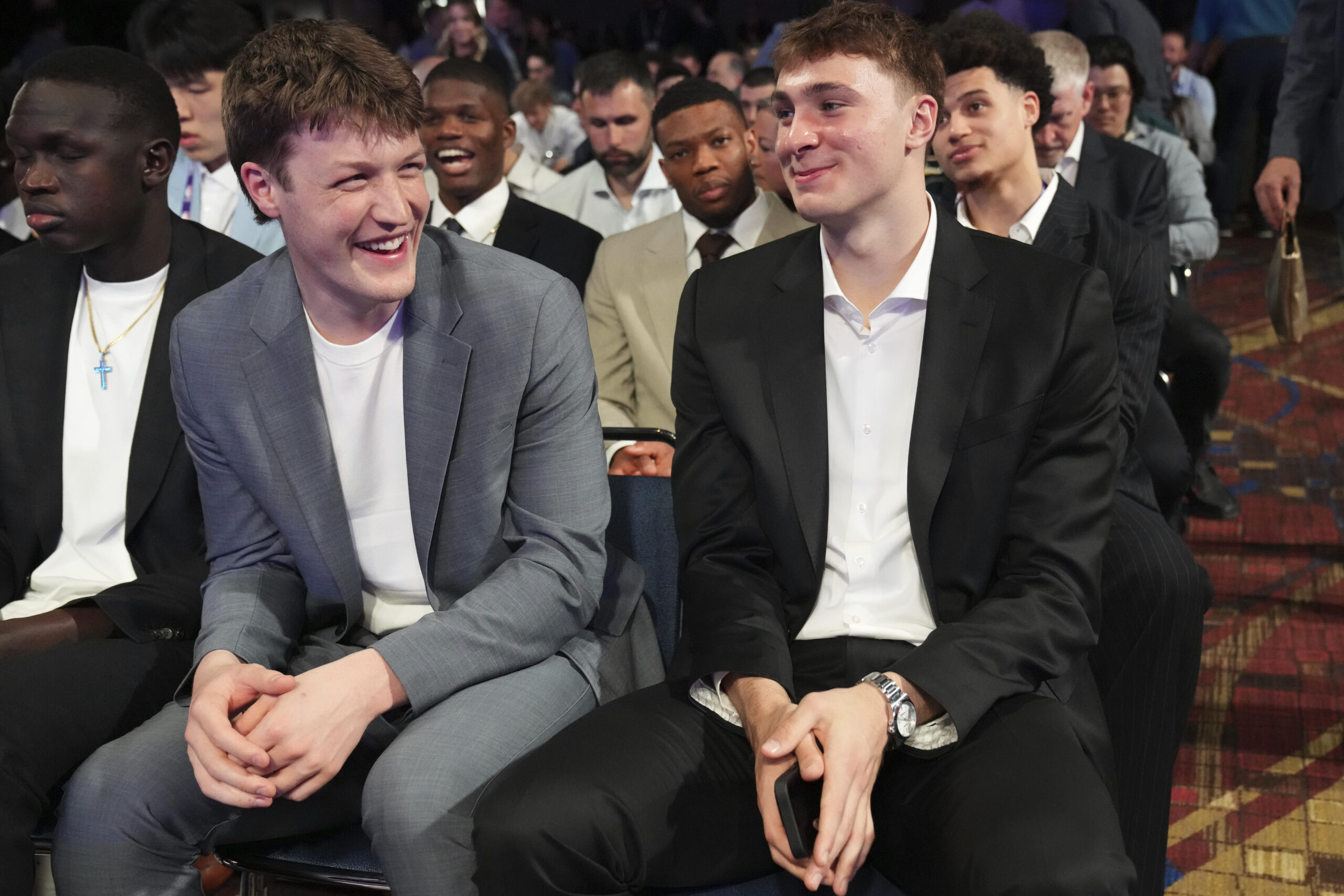 Duke’s Kon Knueppel, left, and Cooper Flagg, right, smile at...