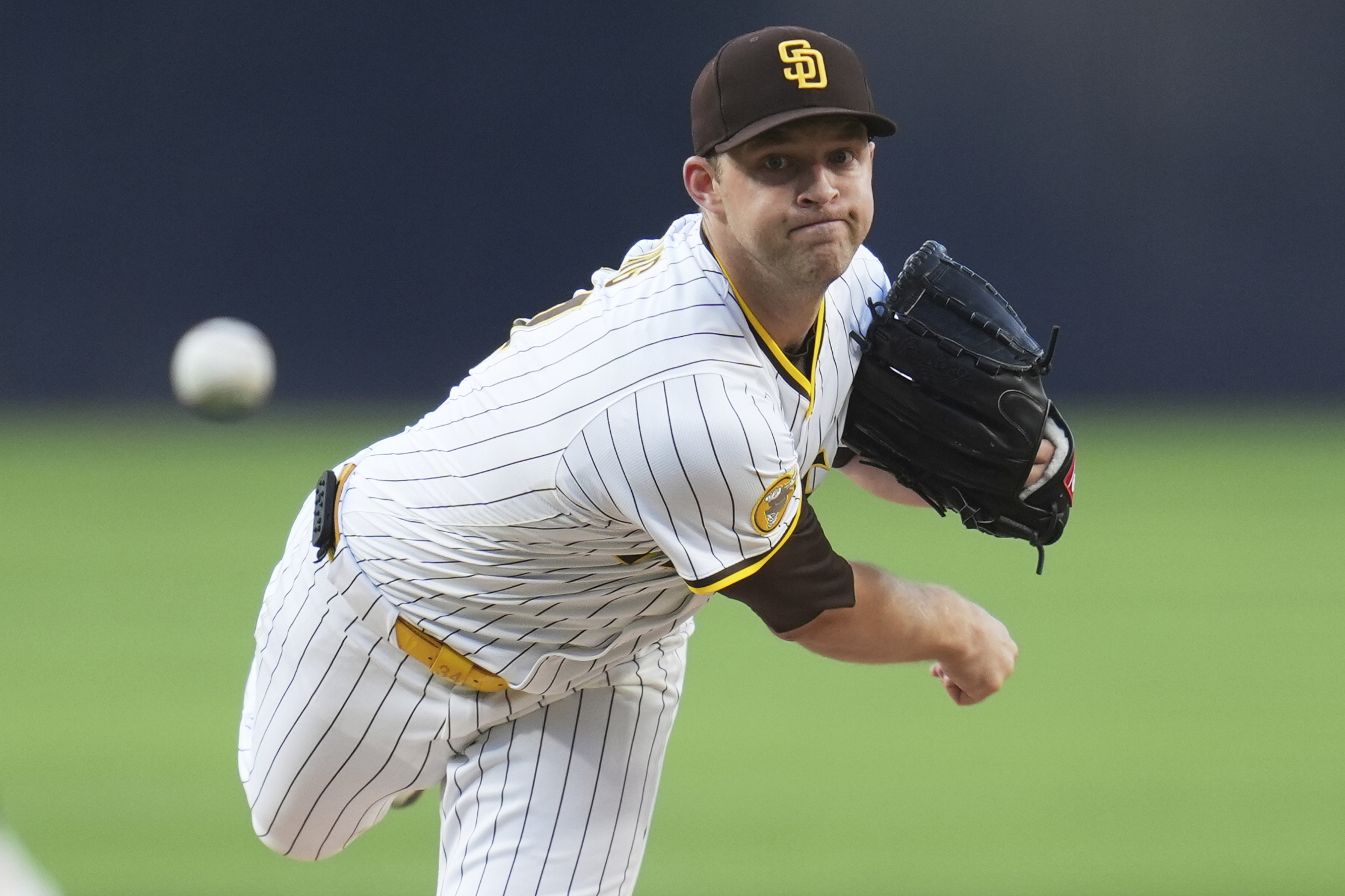 San Diego Padres starting pitcher Michael King throws to the...