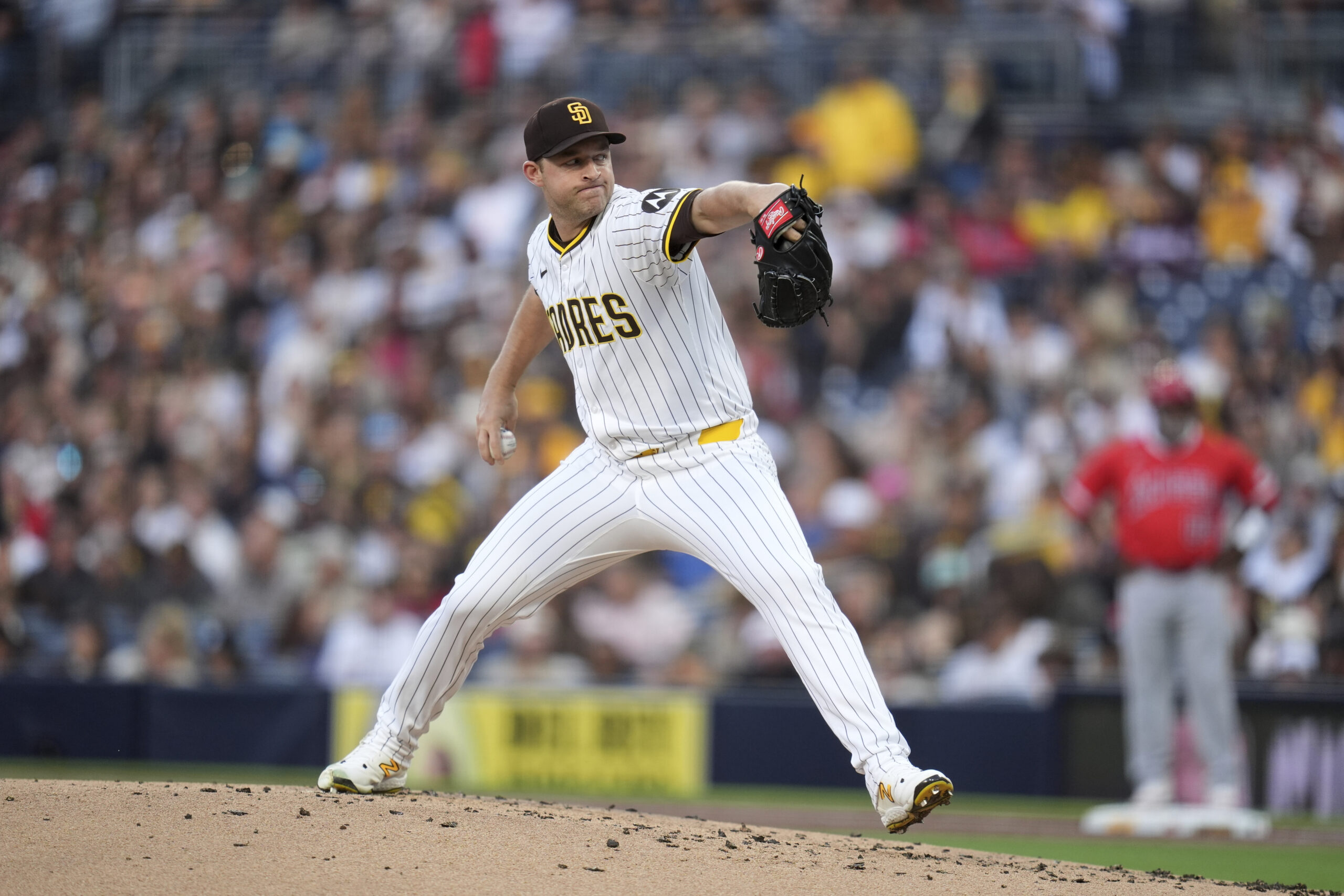 San Diego Padres starting pitcher Michael King throws to the...