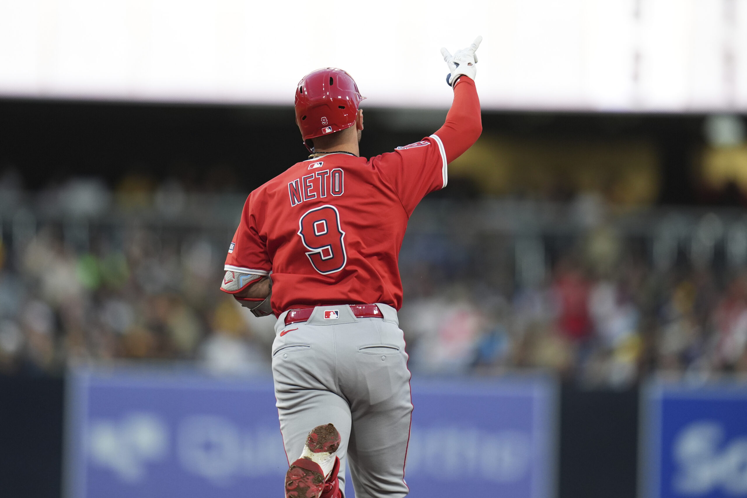 The Angels’ Zach Neto celebrates as he runs the bases...
