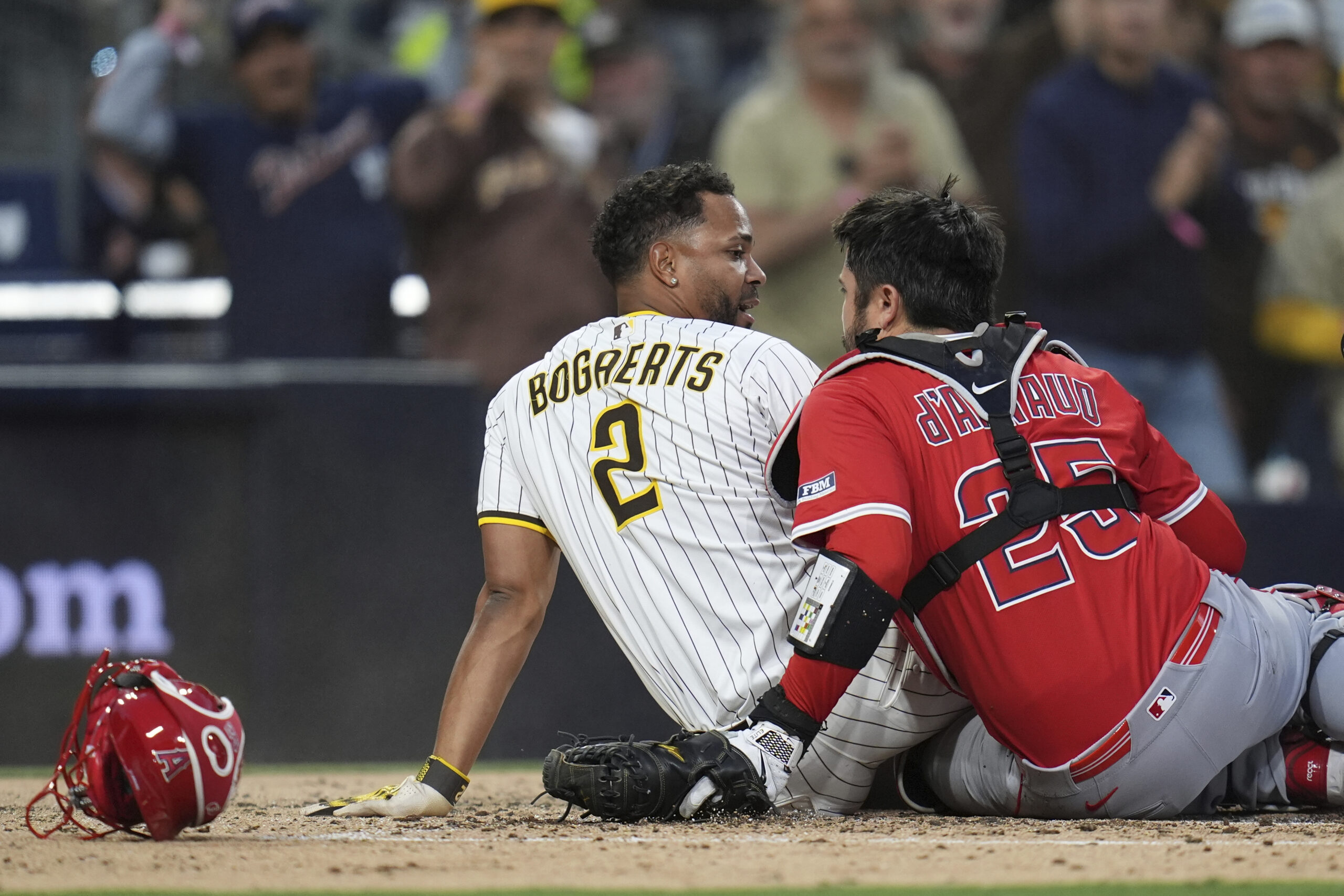 Angels catcher Travis d’Arnaud, right, checks in with the San...