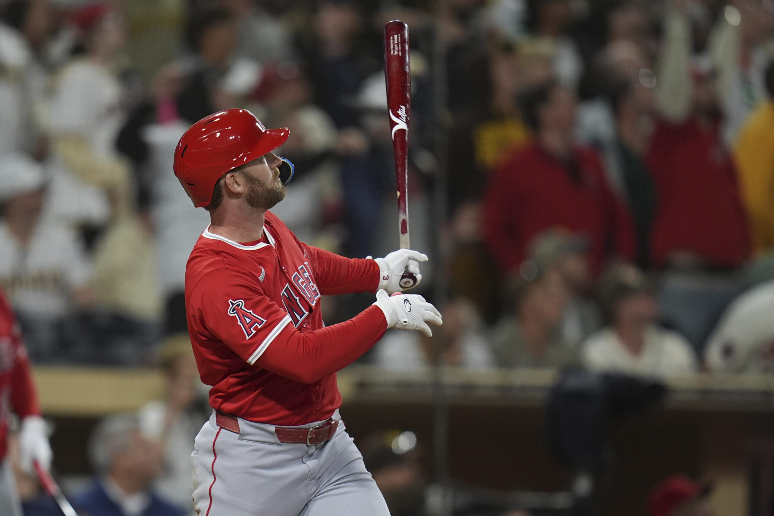 The Angels’ Taylor Ward watches the flight of his tiebreaking...