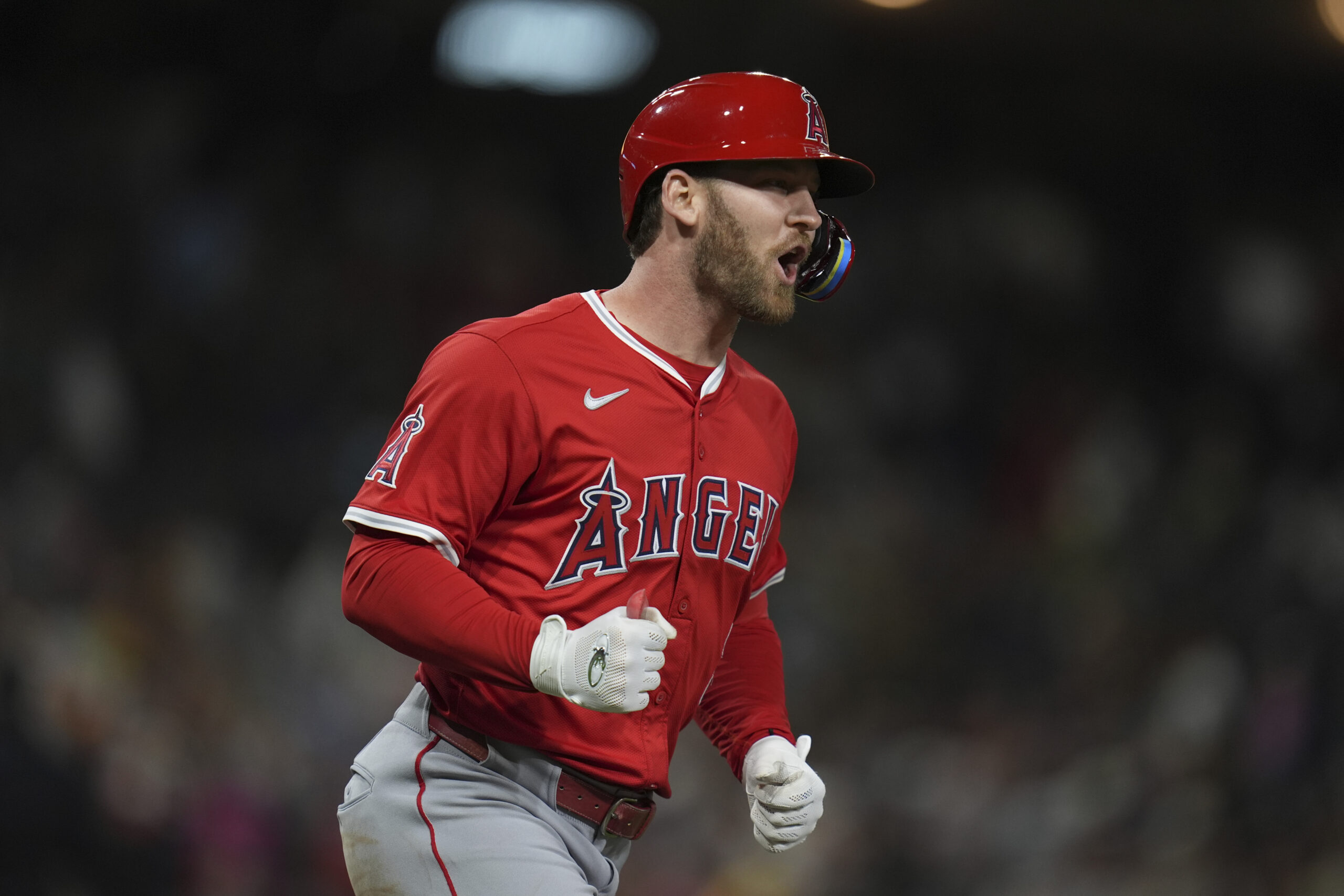 The Angels’ Taylor Ward celebrates after hitting a tiebreaking grand...