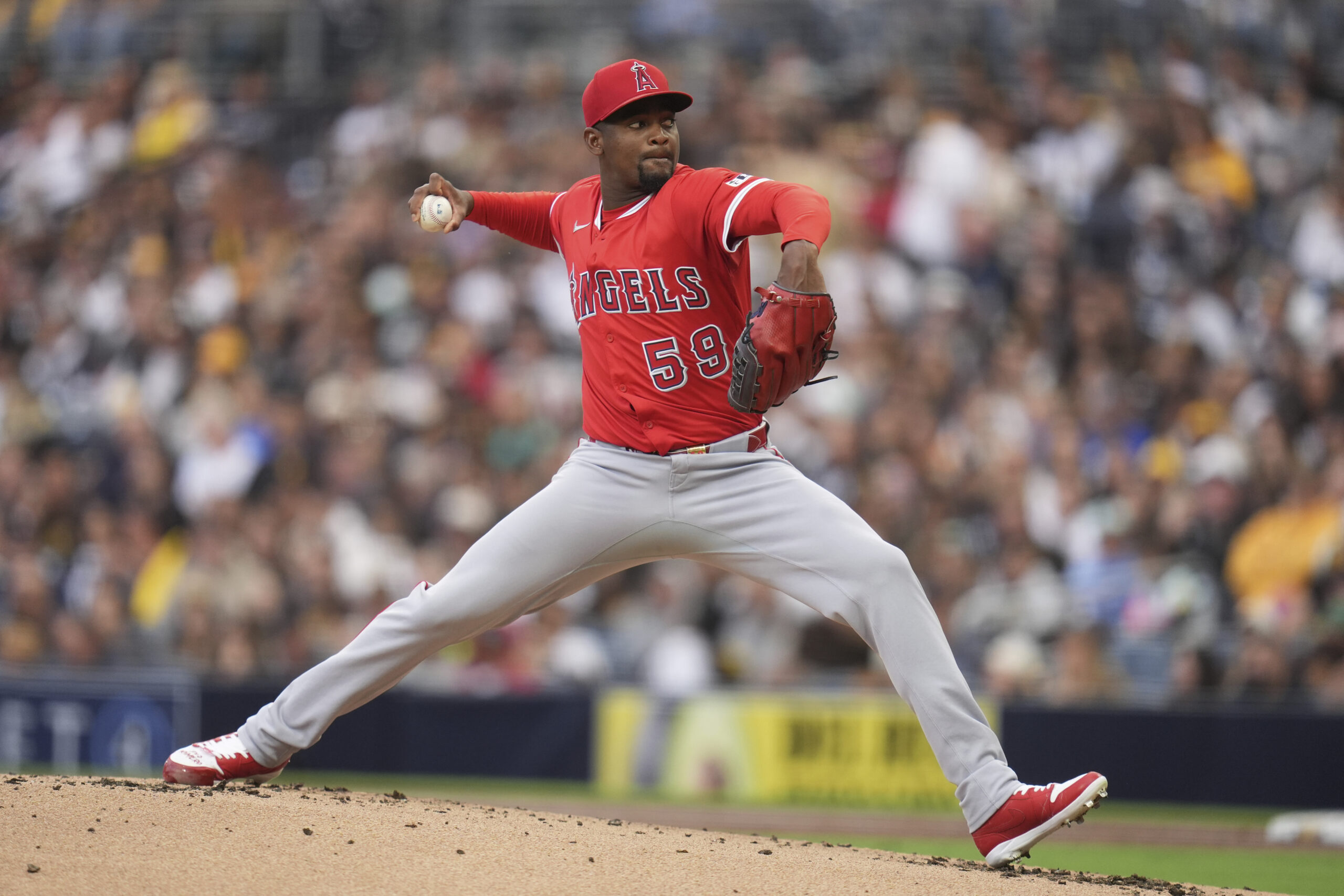 Angels starting pitcher Jose Soriano throws to the plate during...