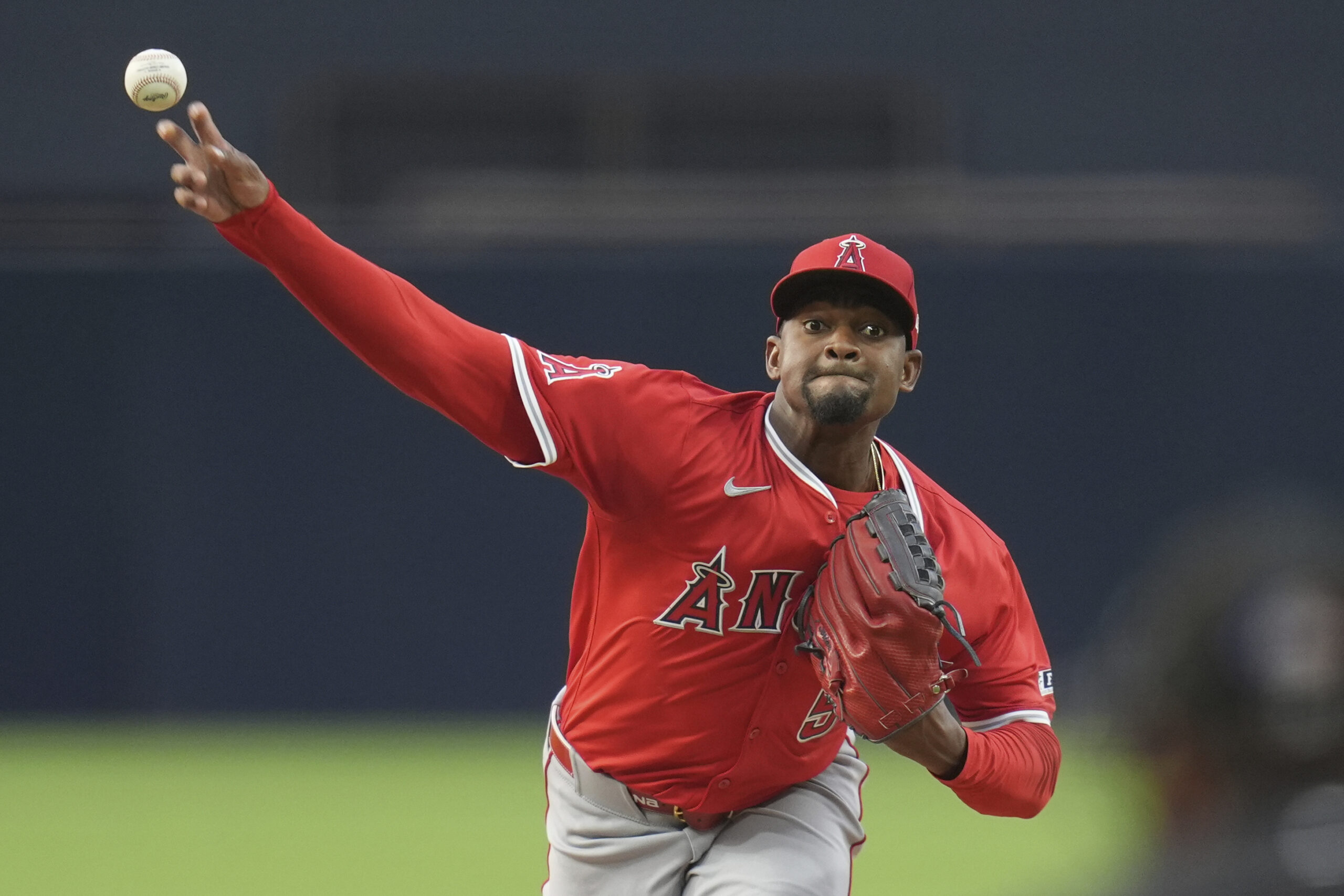 Angels starting pitcher Jose Soriano throws to the plate during...