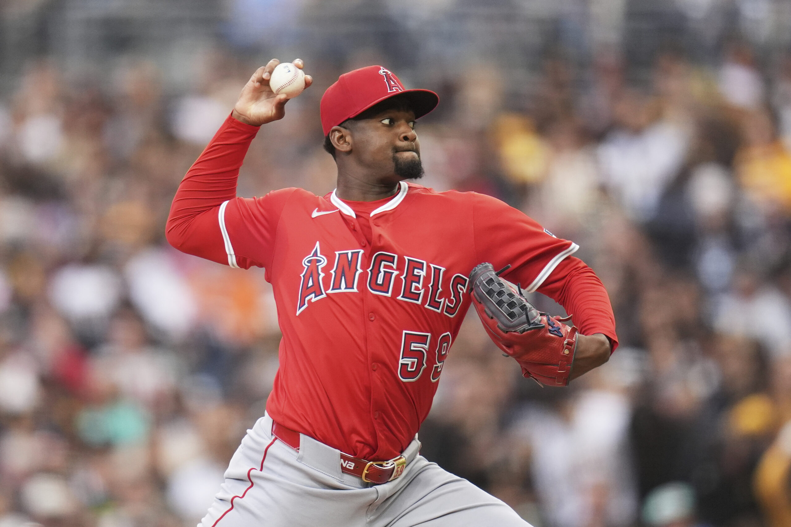 Angels starting pitcher Jose Soriano throws to the plate during...