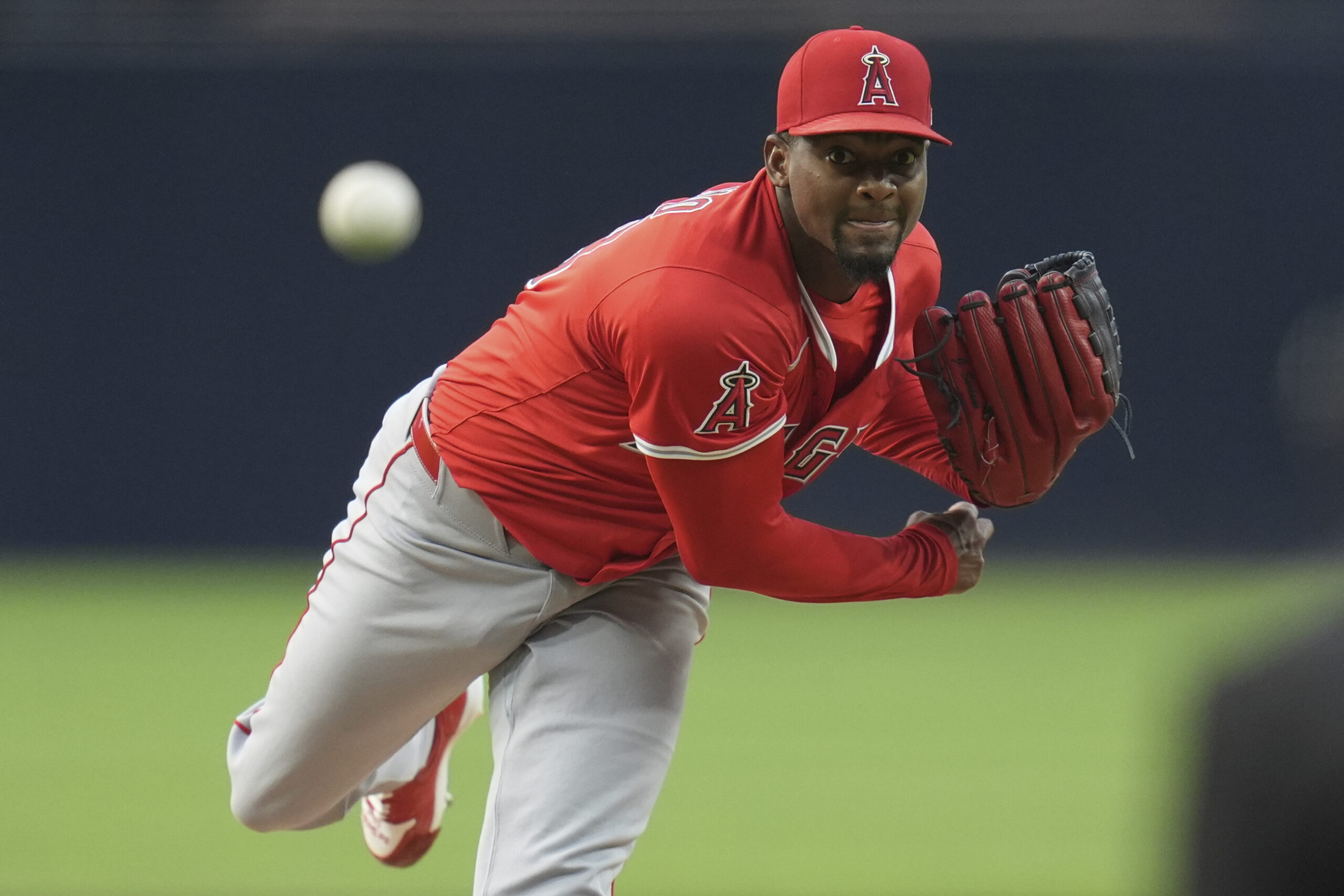 Angels starting pitcher Jose Soriano throws to the plate during...
