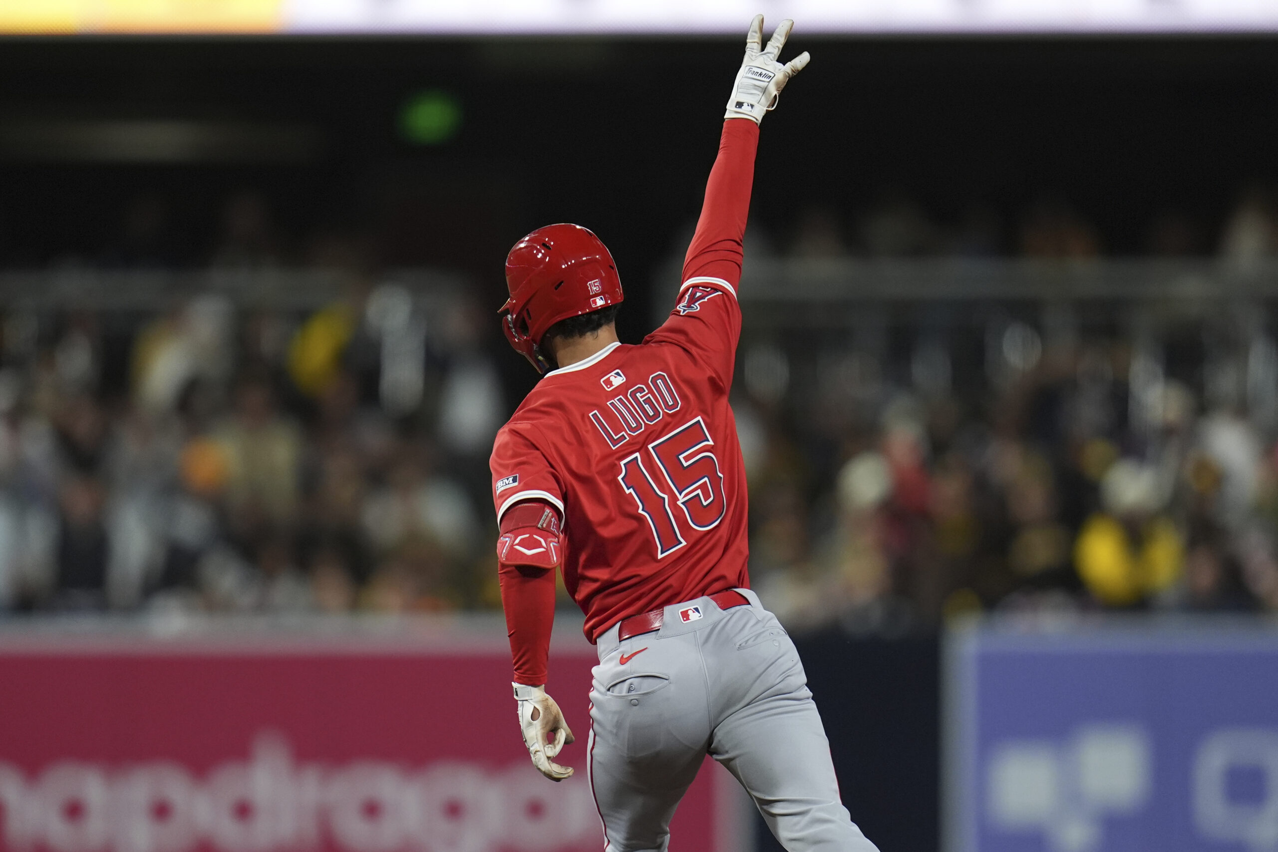 The Angels’ Matthew Lugo celebrates as he runs the bases...
