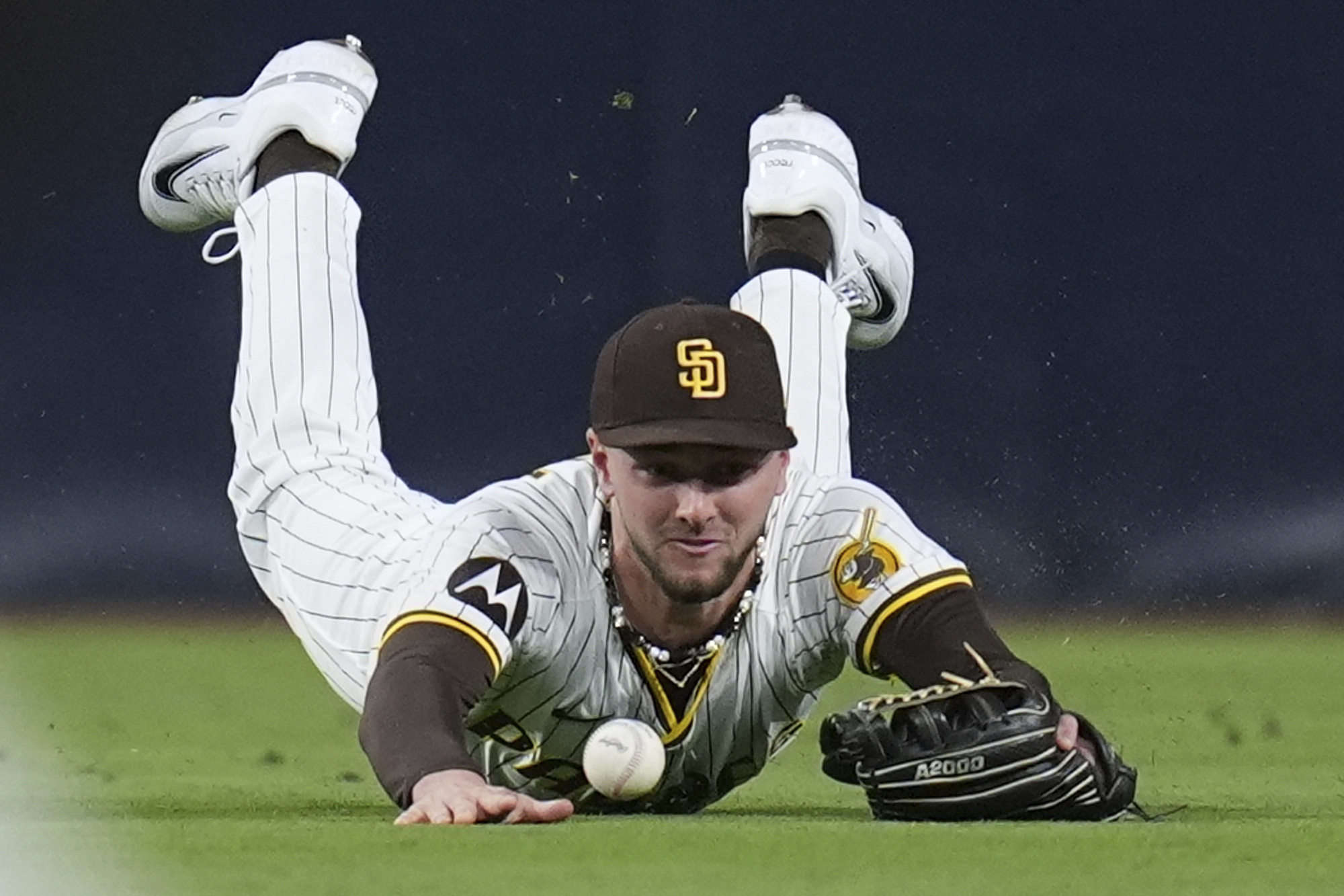 San Diego Padres center fielder Jackson Merrill can’t make the...