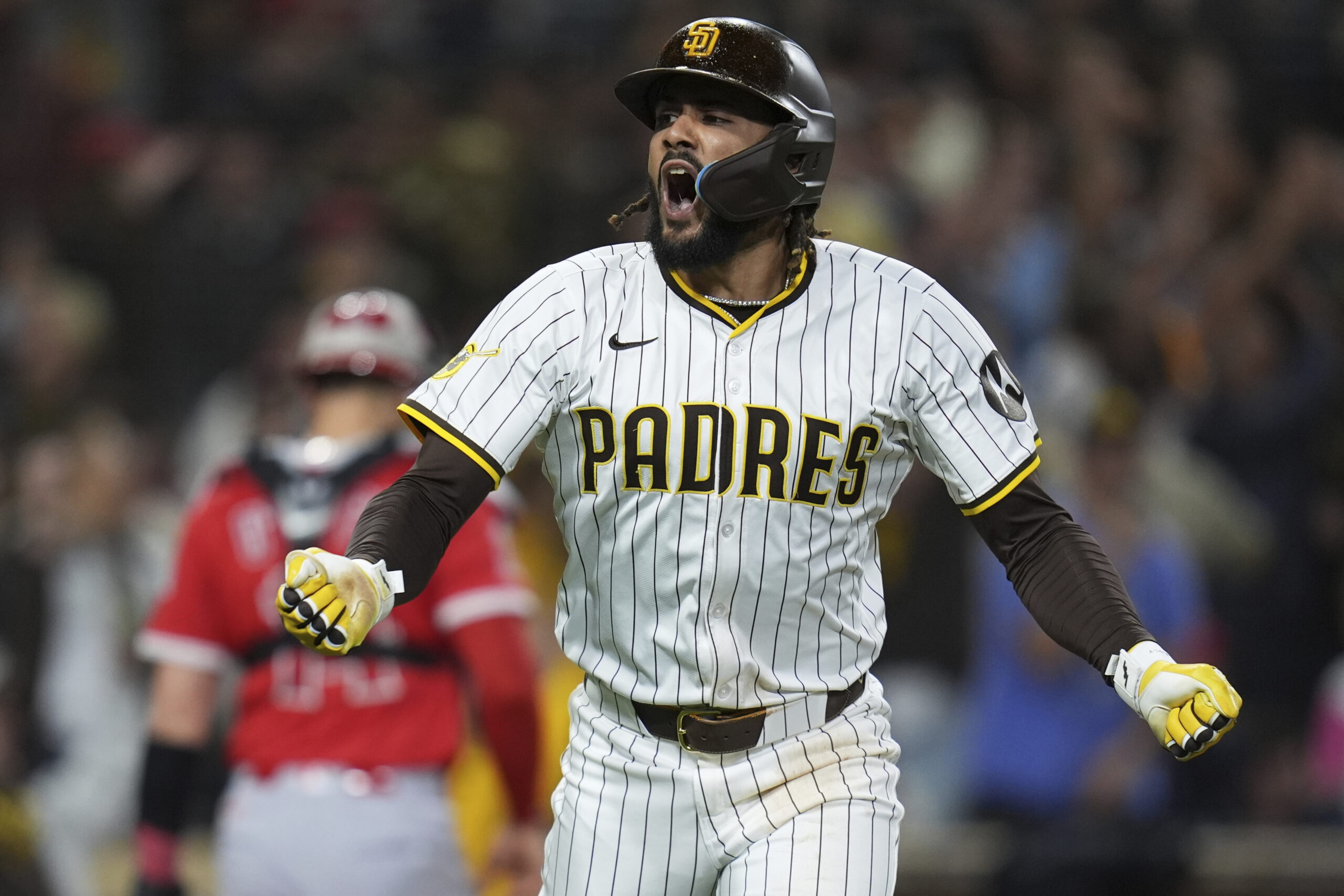 San Diego Padres star Fernando Tatis Jr. celebrates after hitting...