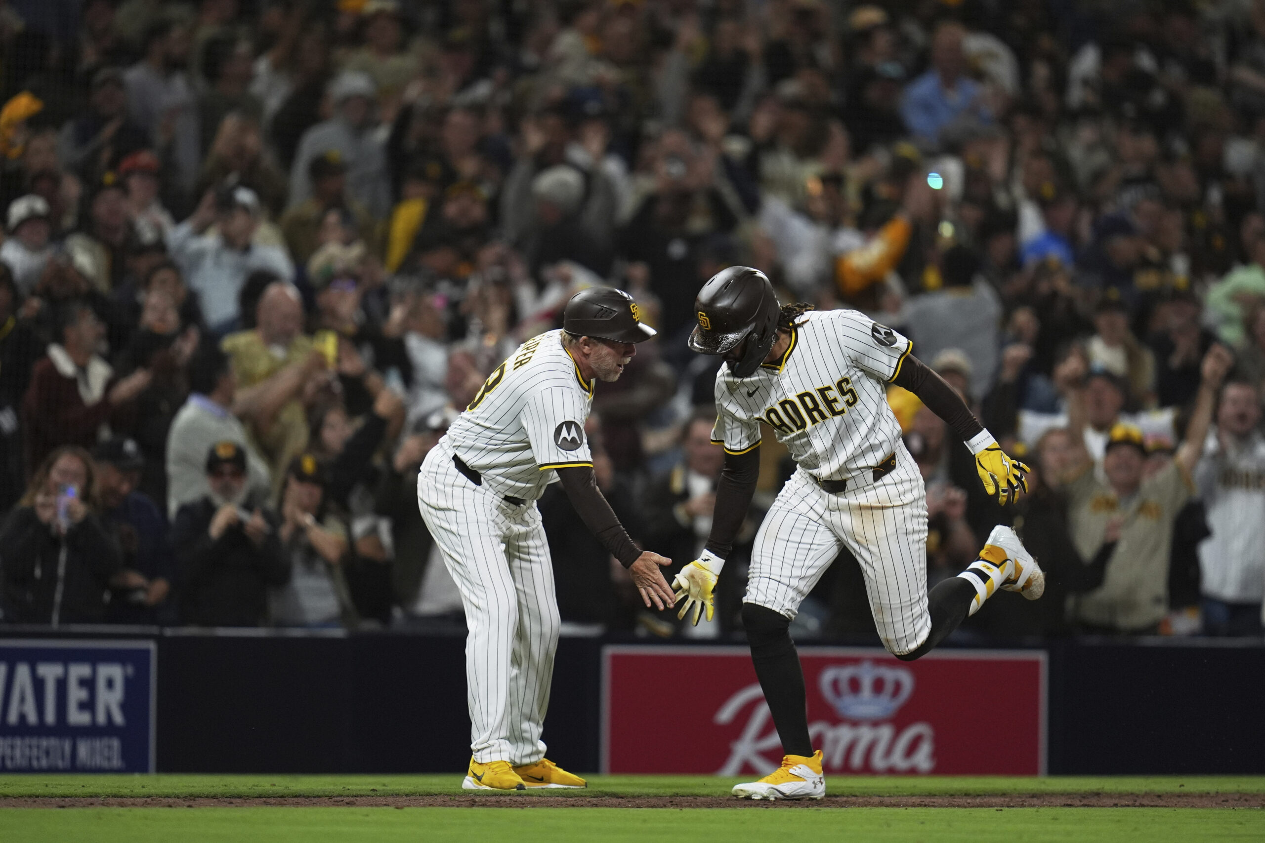 San Diego Padres star Fernando Tatis Jr., right, celebrates with...