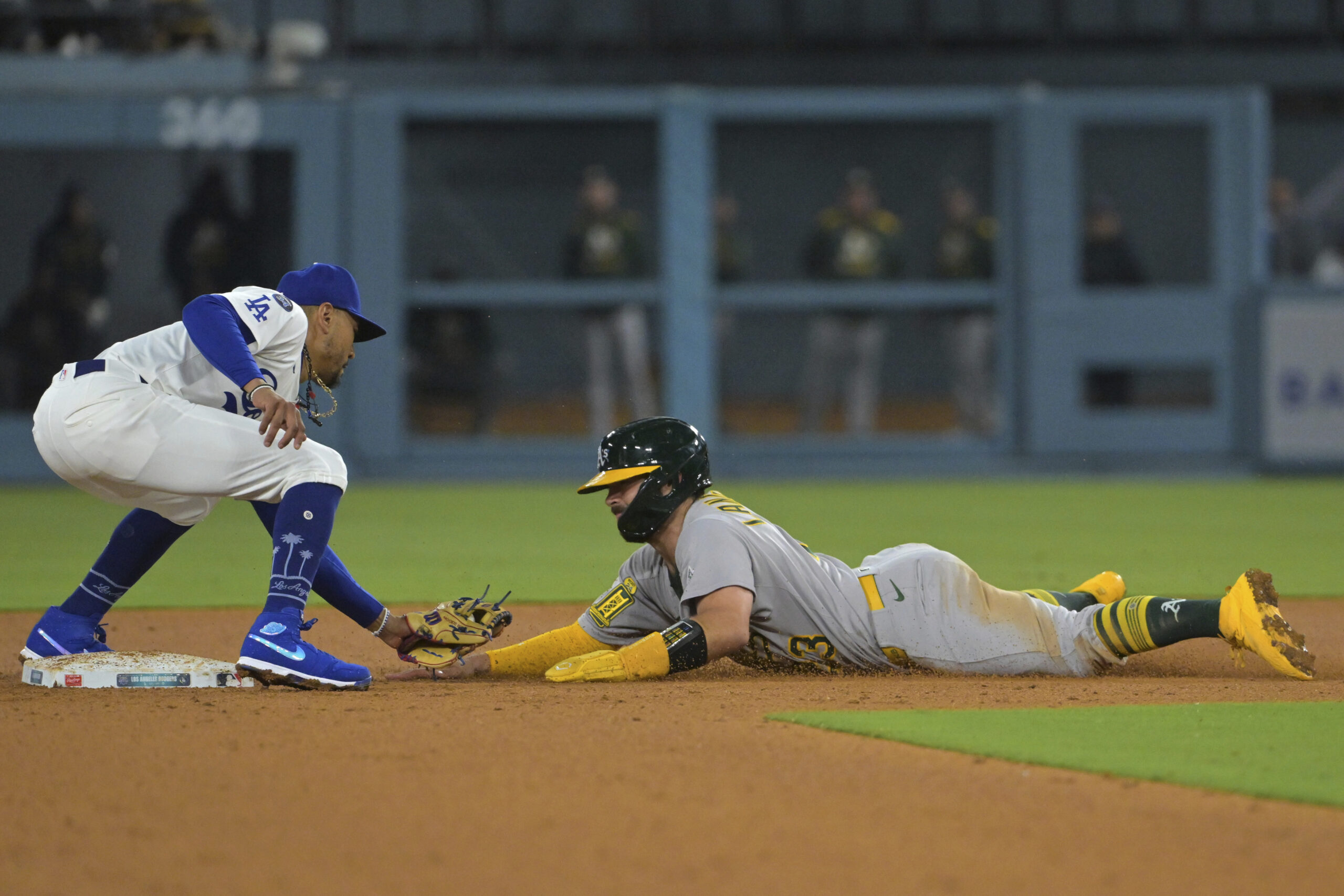 The Athletics’ Shea Langeliers is thrown out trying to steal...