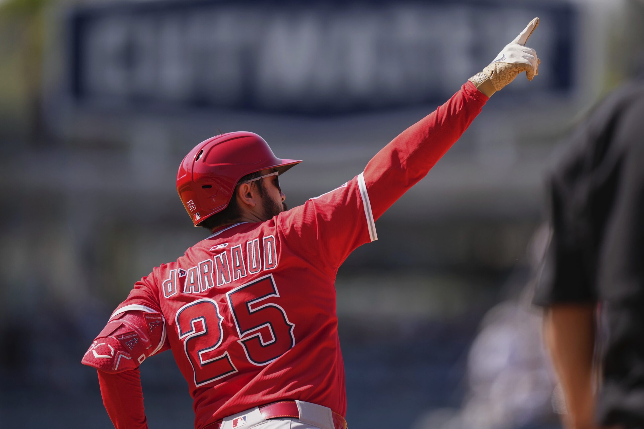 Angels’ Travis d’Arnaud gestures after hitting a solo home run...