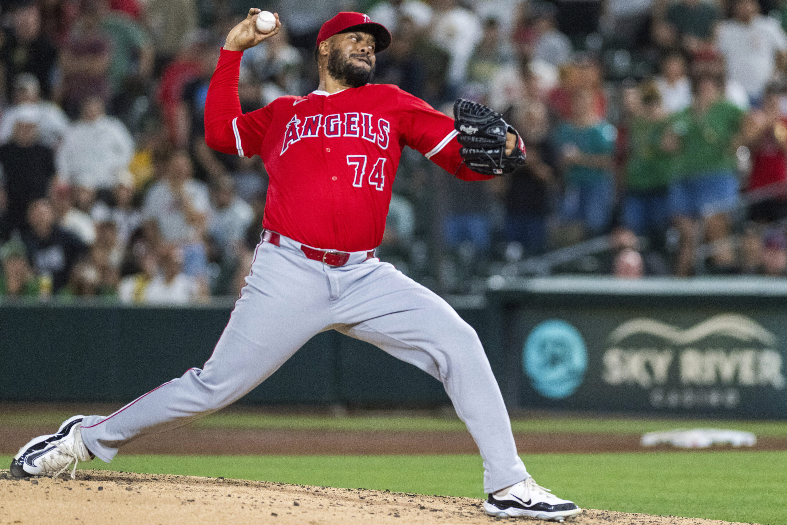 Angels pitcher Kenley Jansen (74) throws during the ninth inning...