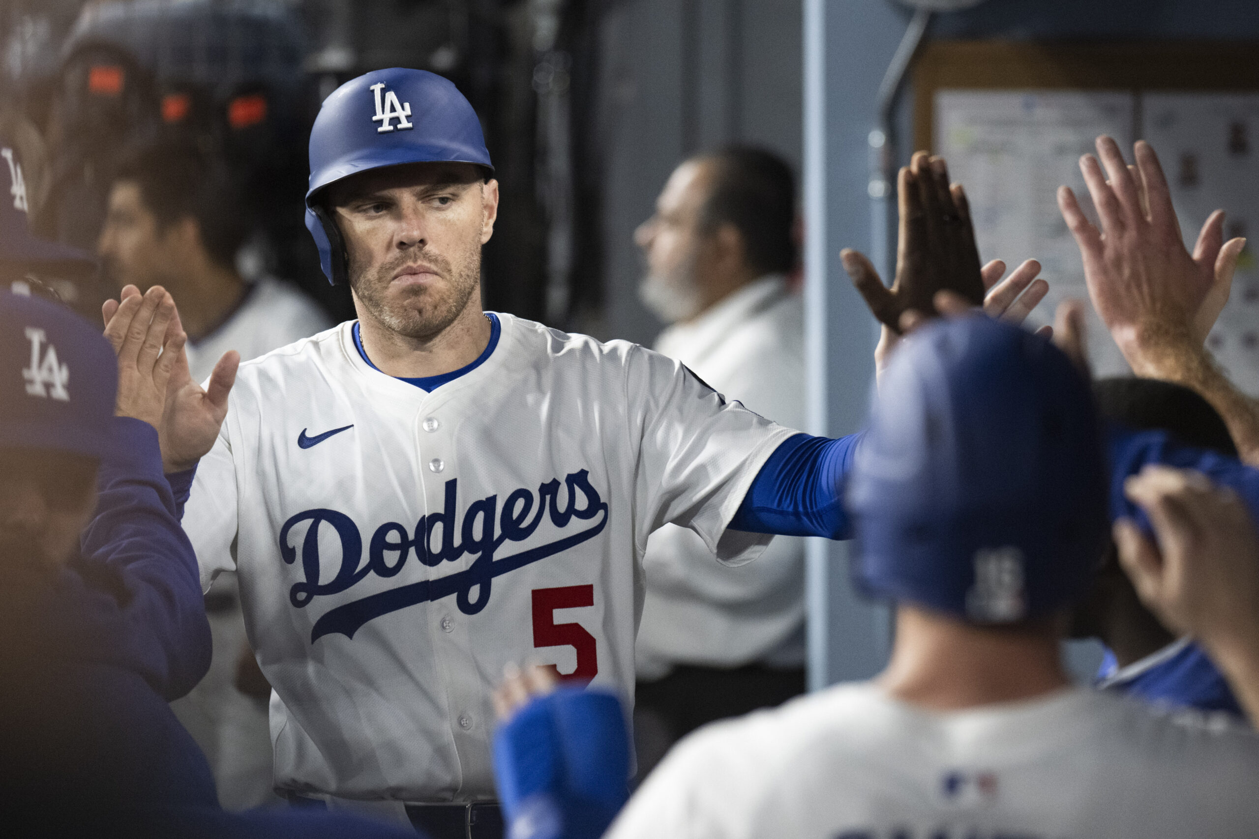 Dodgers’ Freddie Freeman celebrates after scoring on a fielder’s choice...