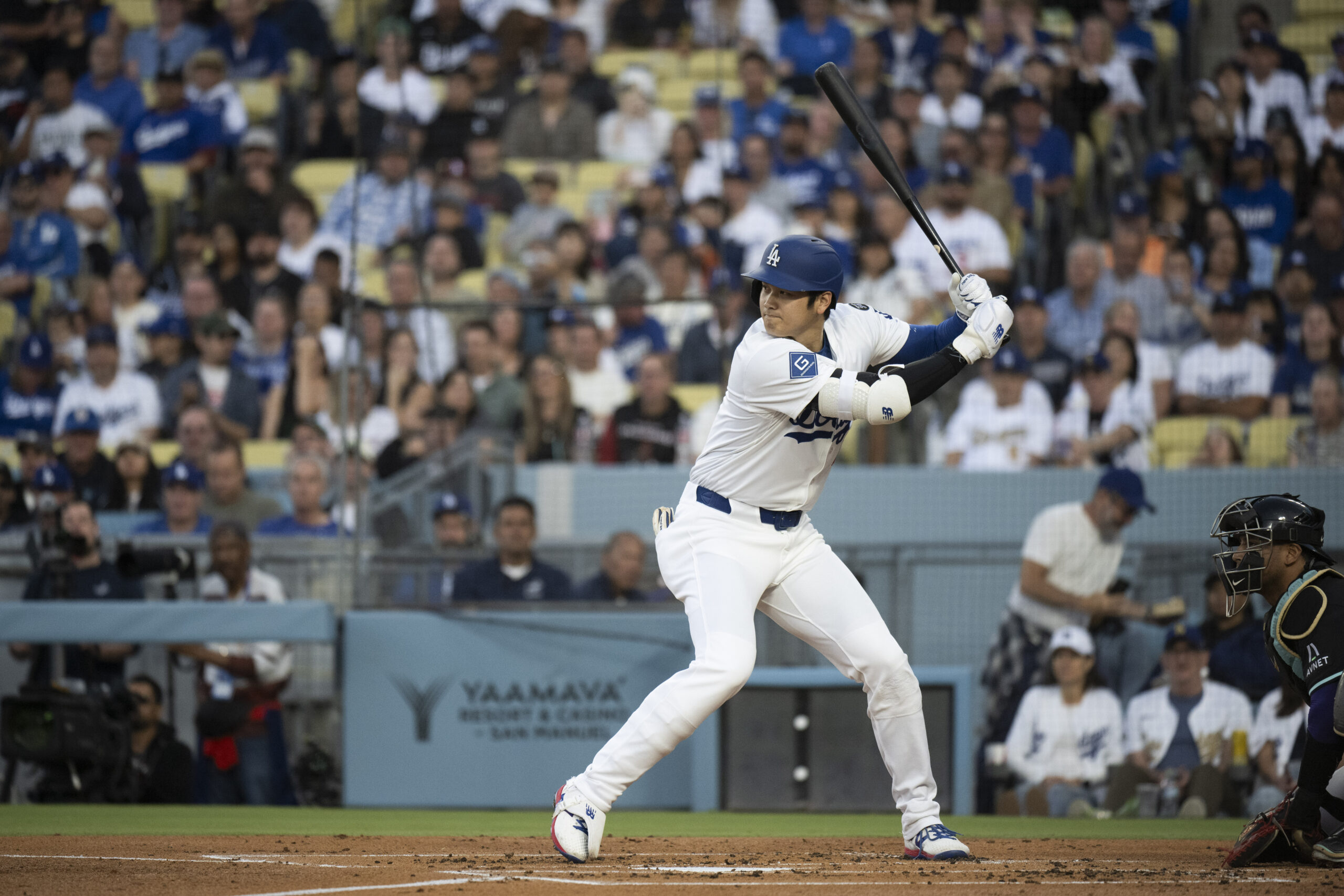 Dodgers’ Shohei Ohtani bats during a baseball game against the...