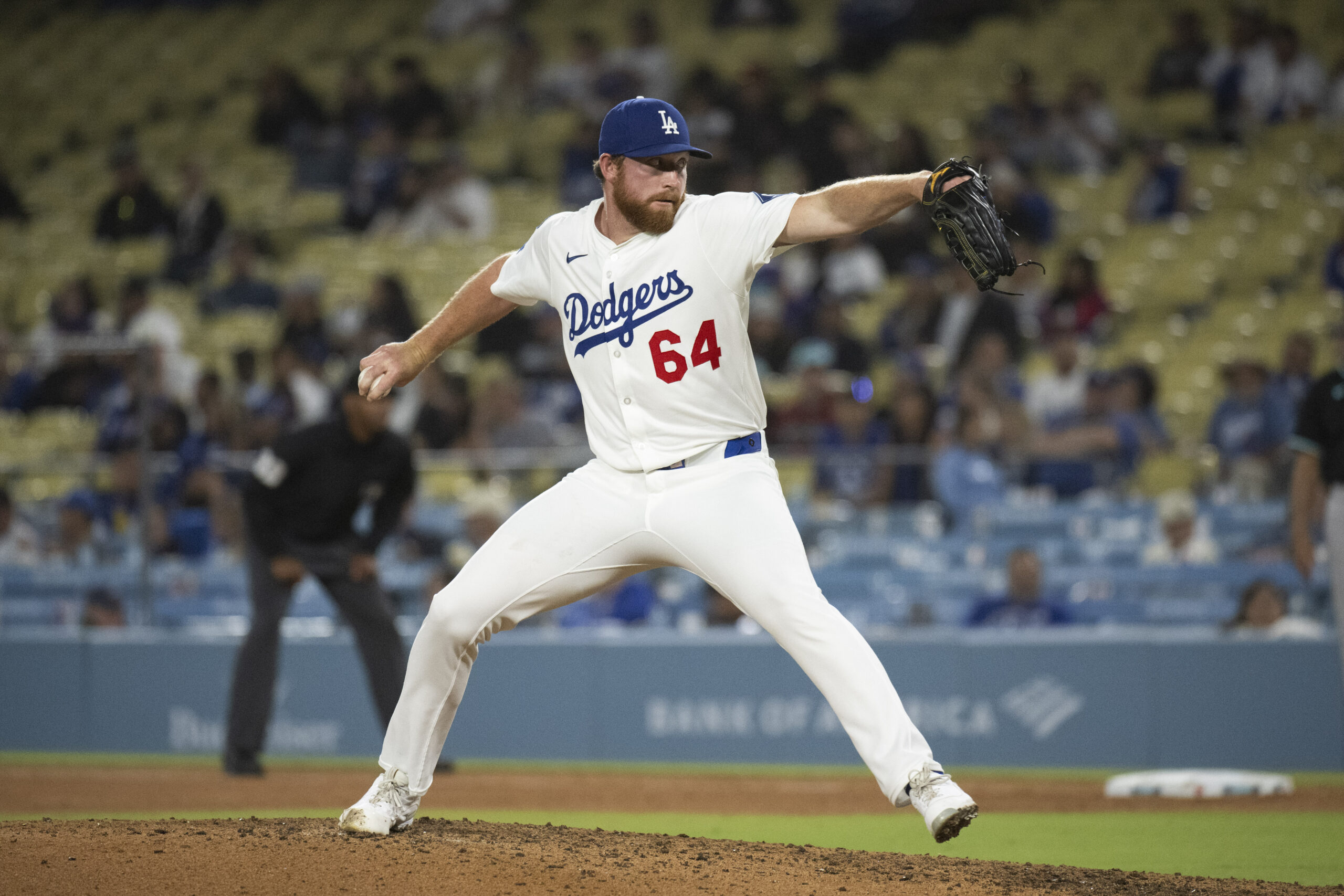 Dodgers relief pitcher Matt Sauer delivers a pitch during a...