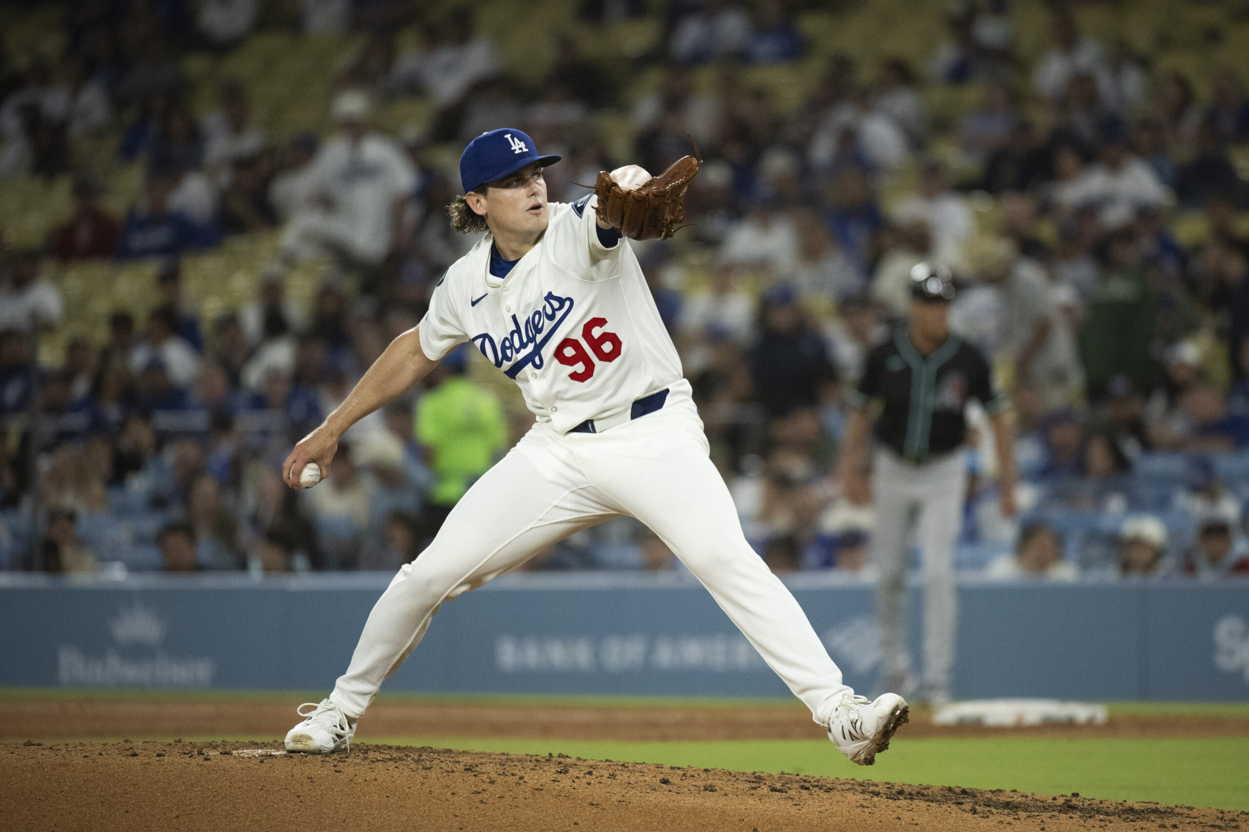 Dodgers relief pitcher Landon Knack delivers. pitch during a baseball...