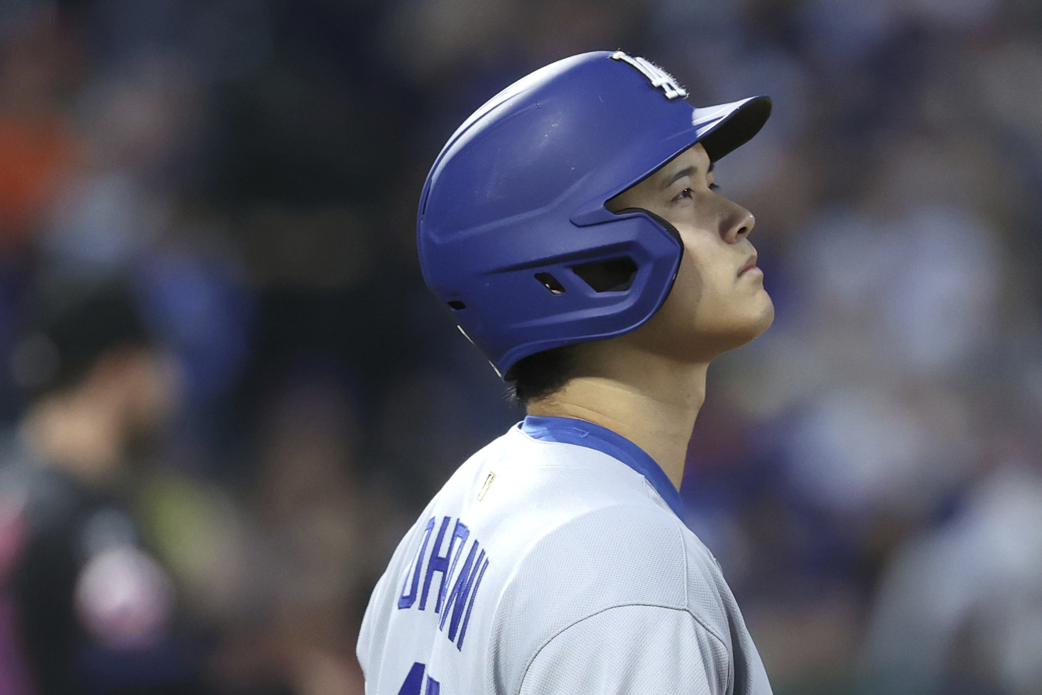 Dodgers star Shohei Ohtani stands on first base during the...