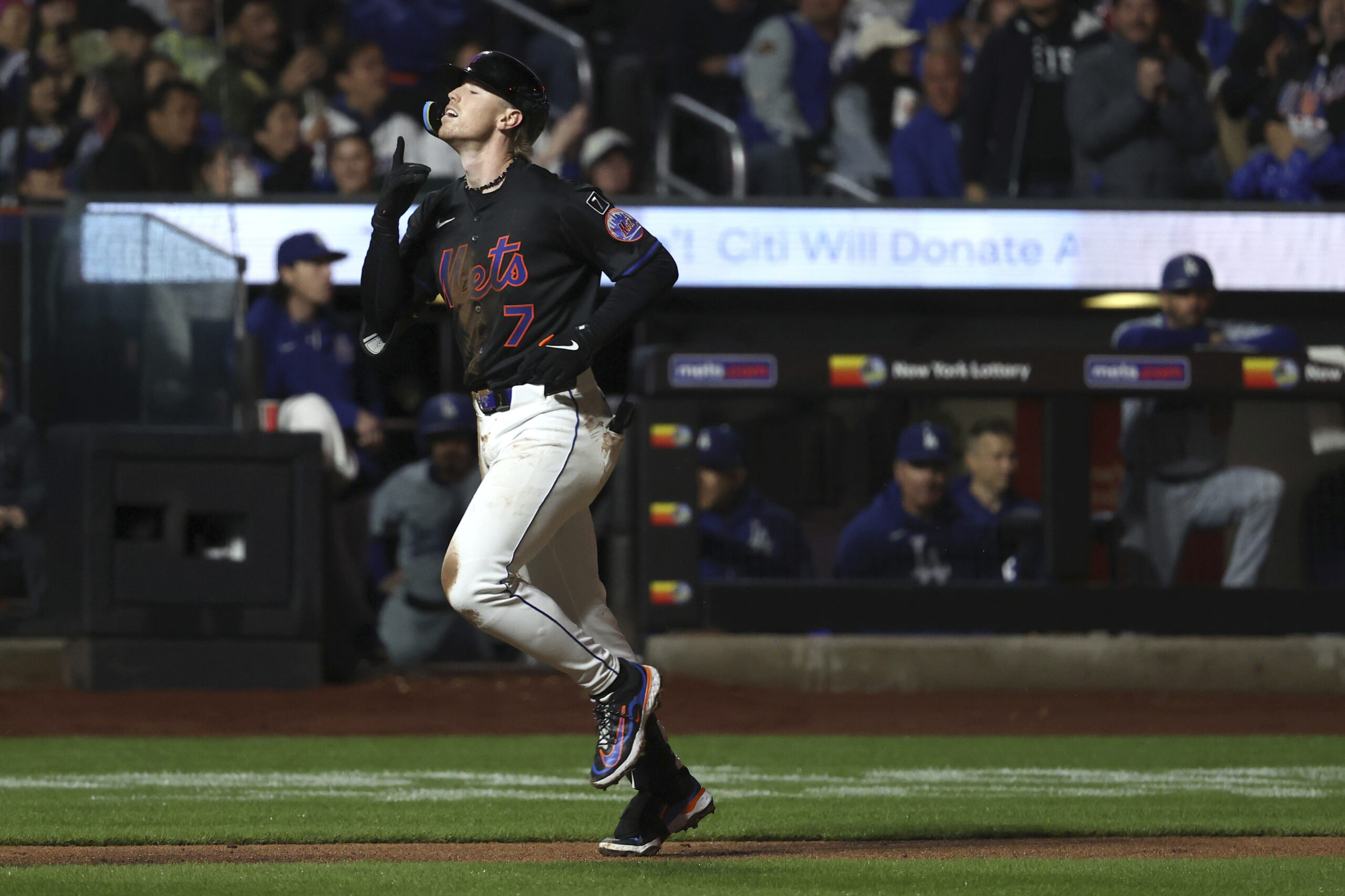 The New York Mets’ Brett Baty reacts after hitting a...