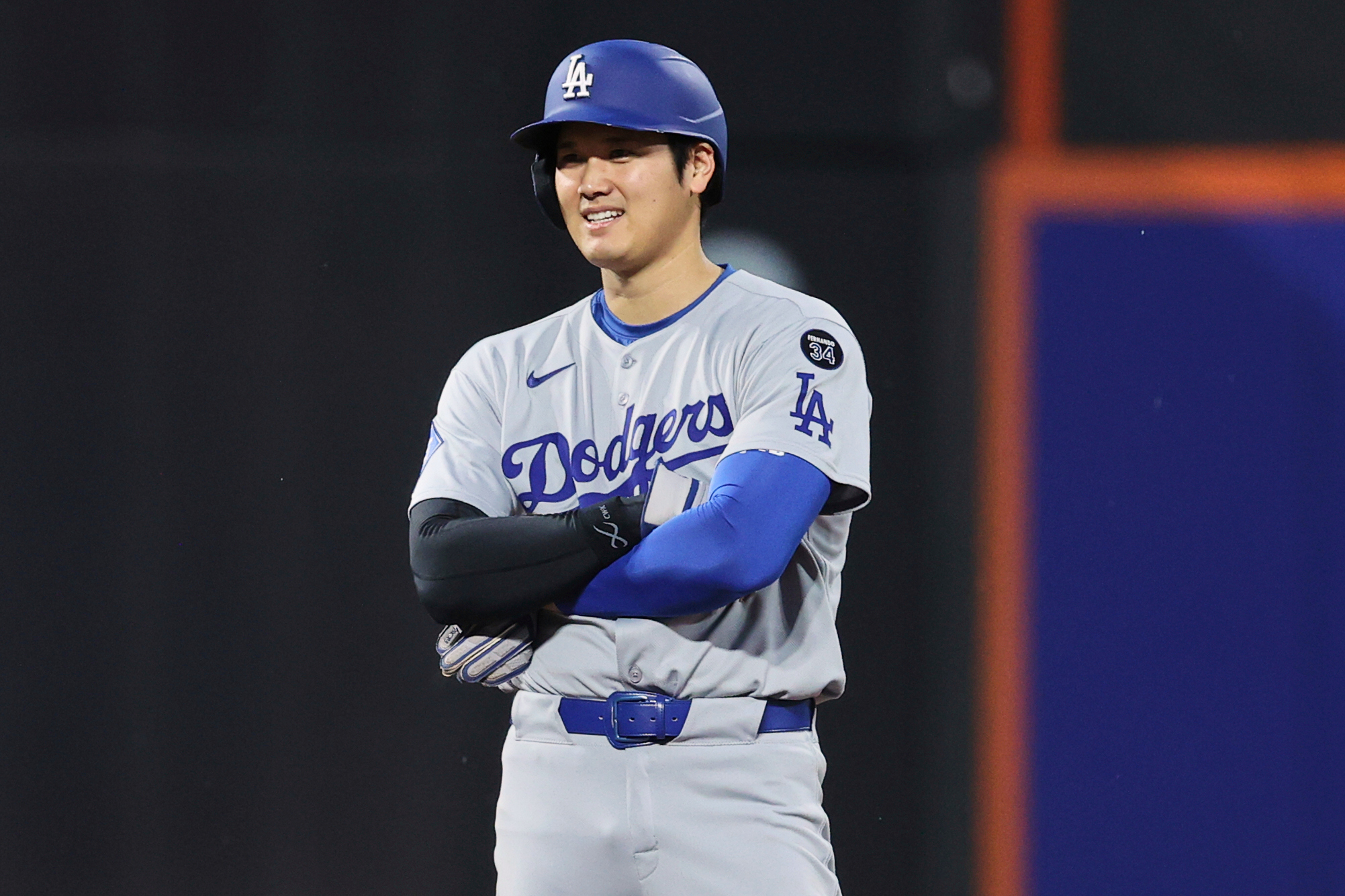 Dodgers star Shohei Ohtani stands on second base during the...