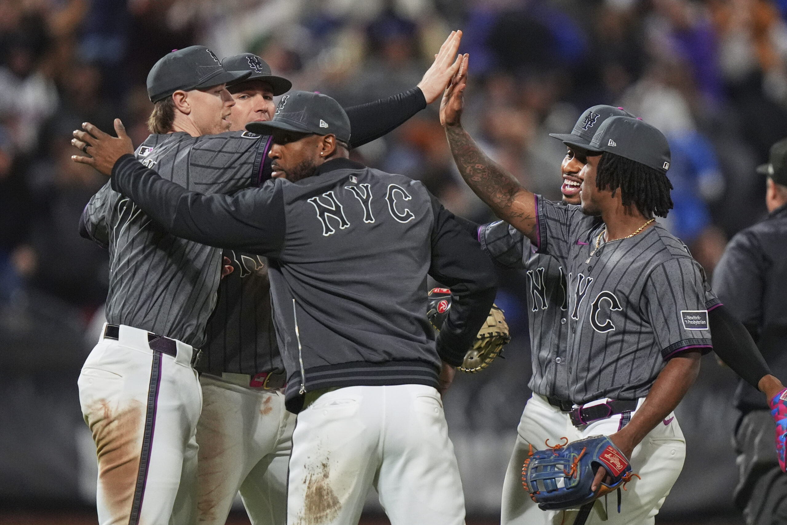 New York Mets’ Brett Baty, left, celebrates with Starling Marte,...