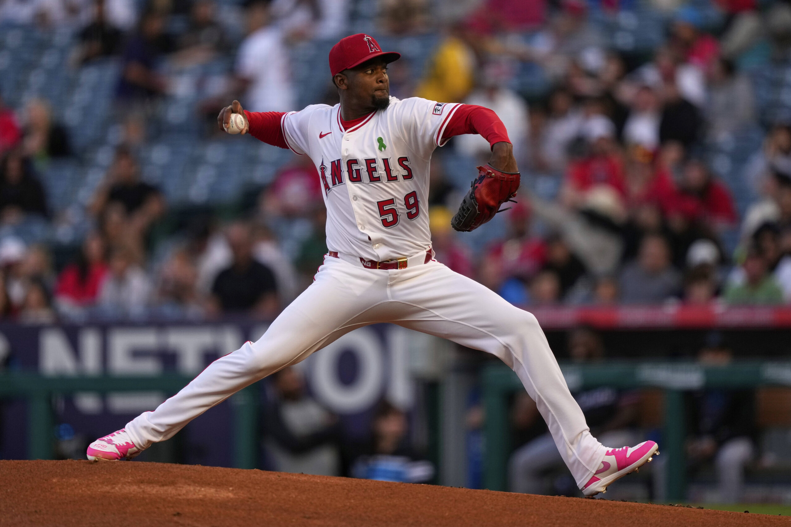 Angels starting pitcher Jose Soriano throws to the plate during...