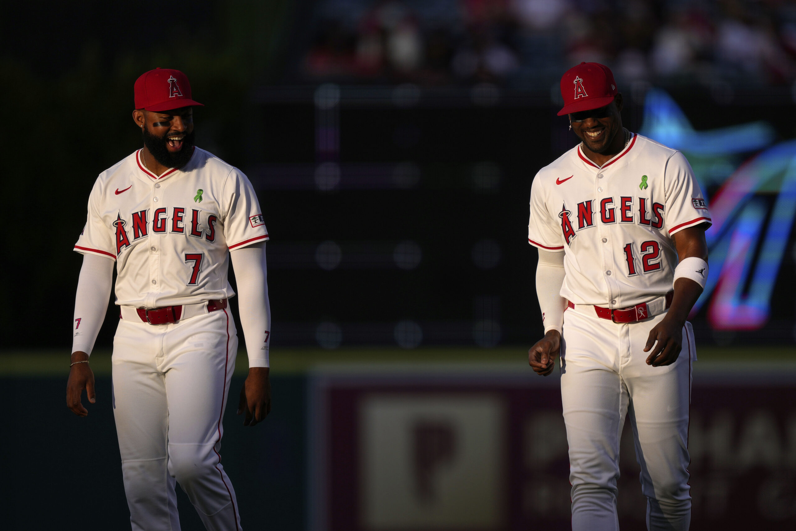 Angels’ Jo Adell, left, and Jorge Soler chat prior to...