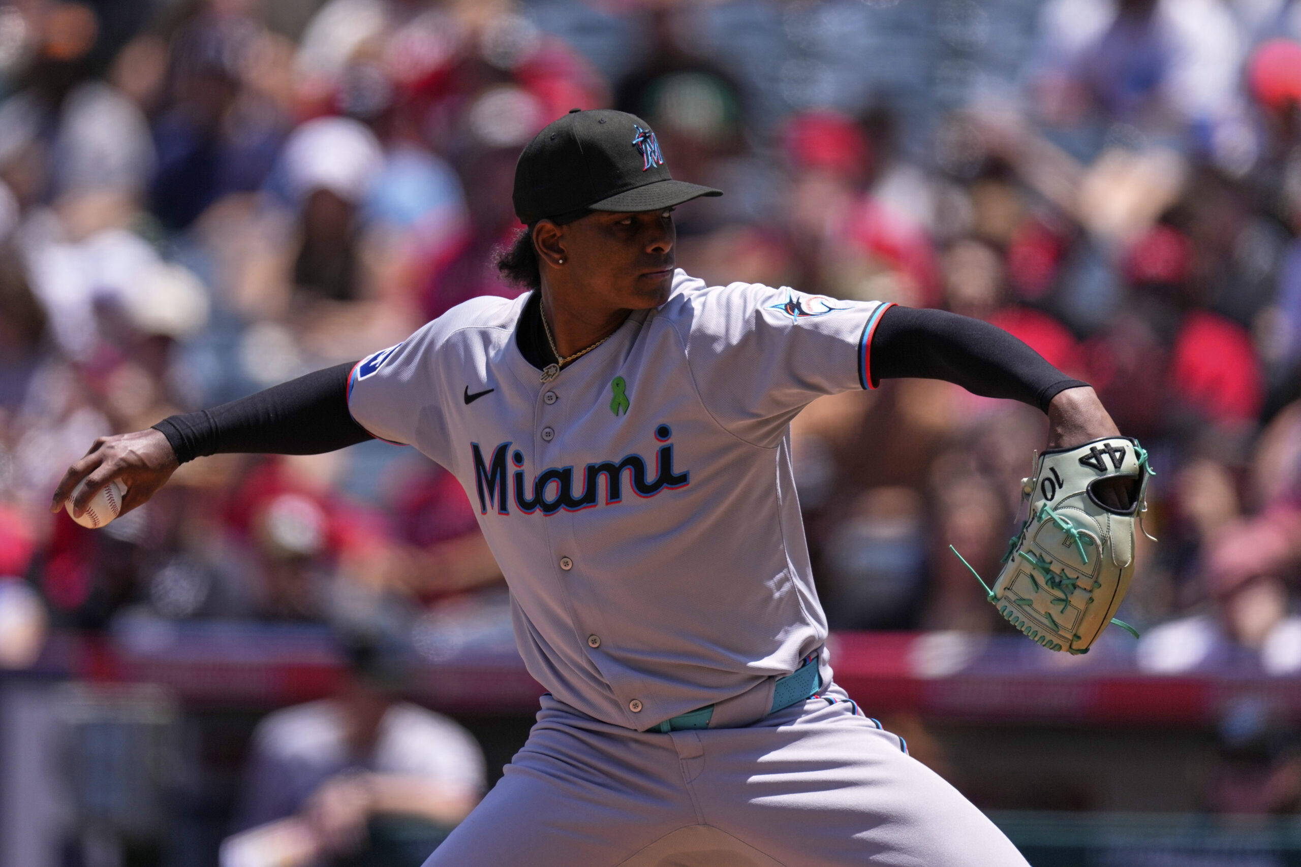 Miami Marlins starting pitcher Edward Cabrera throws to the plate...