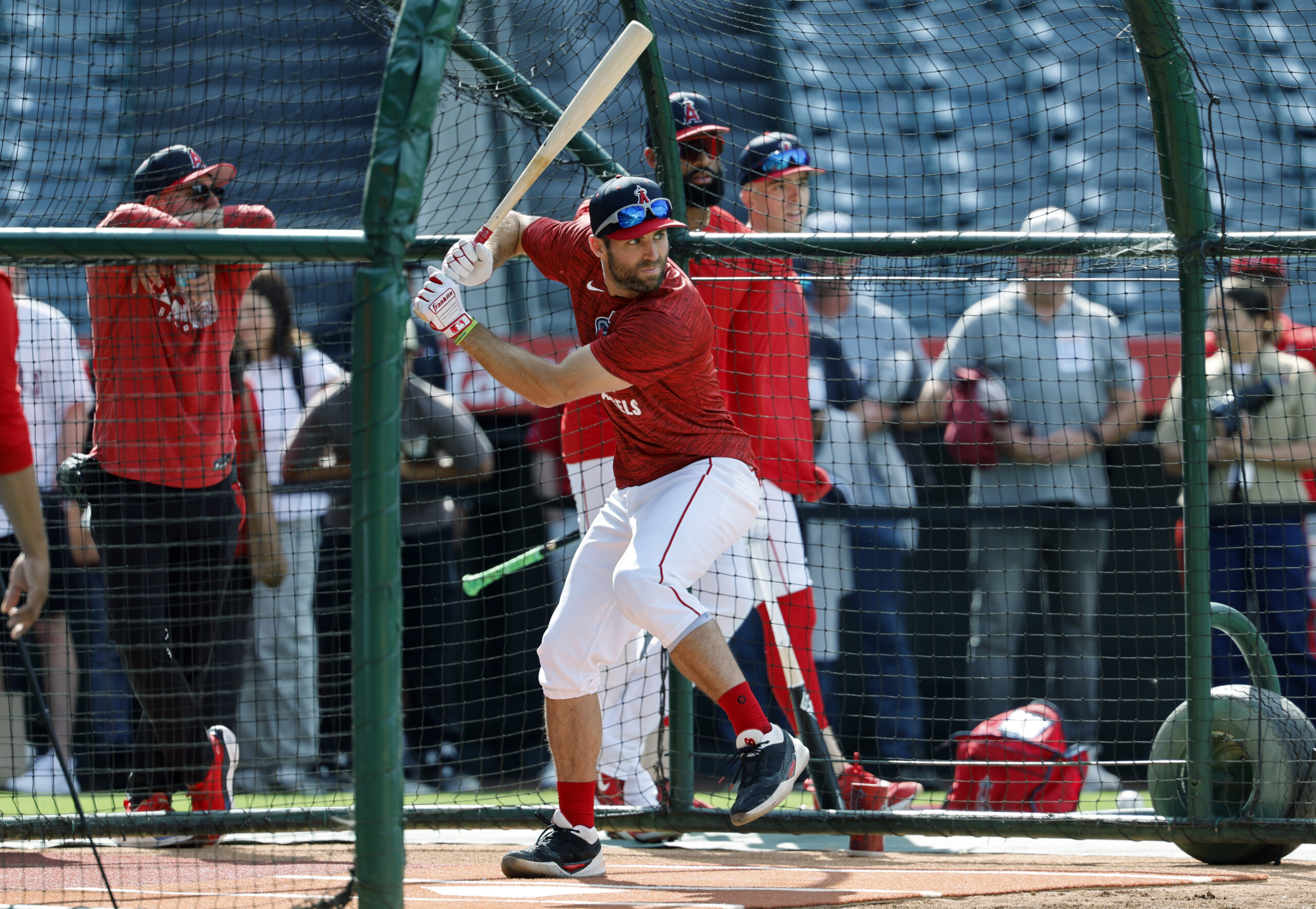 New Angels utility man Chris Taylor takes batting practice before...