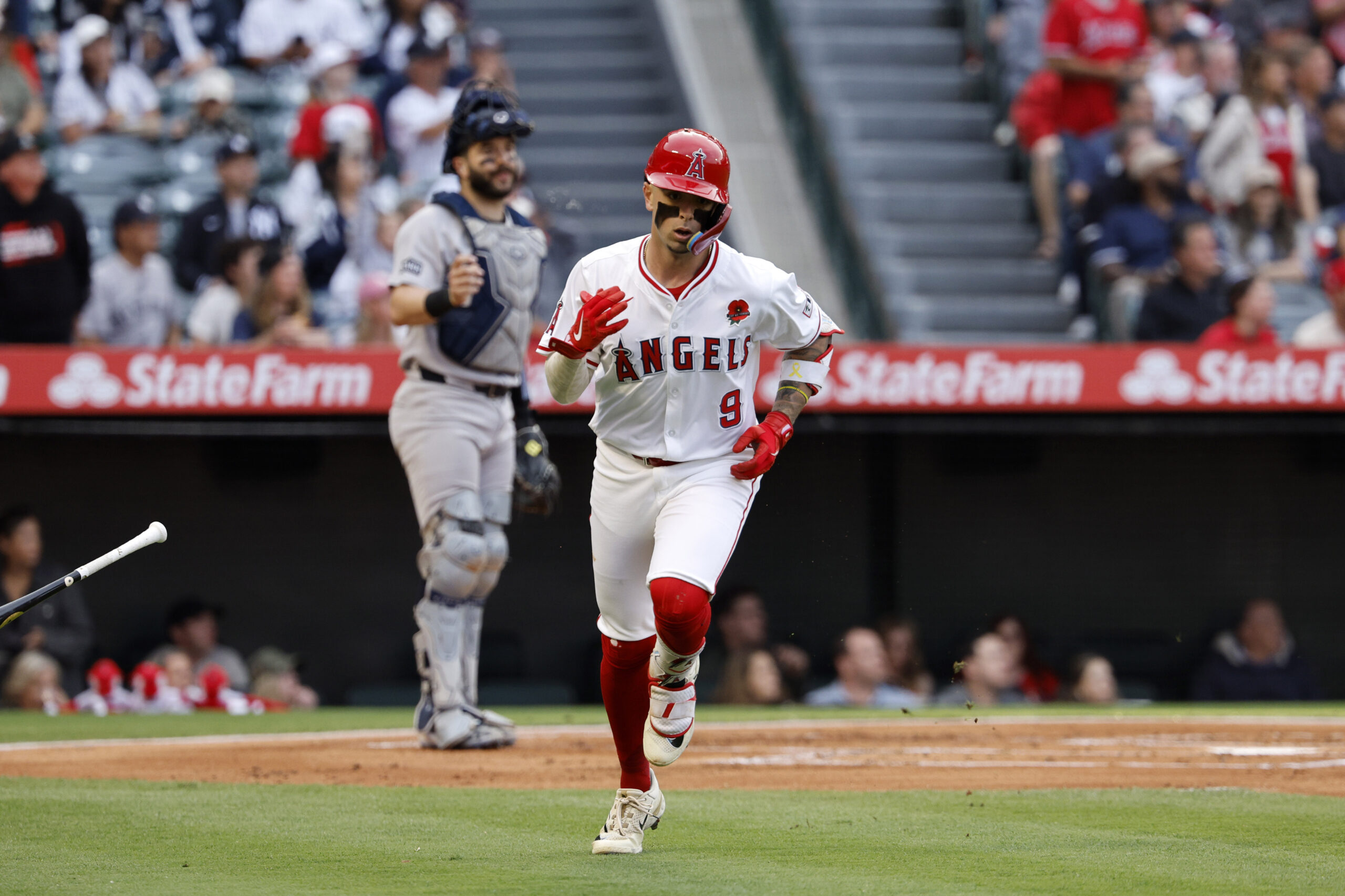 The Angels’ Zach Neto begins to run the bases after...