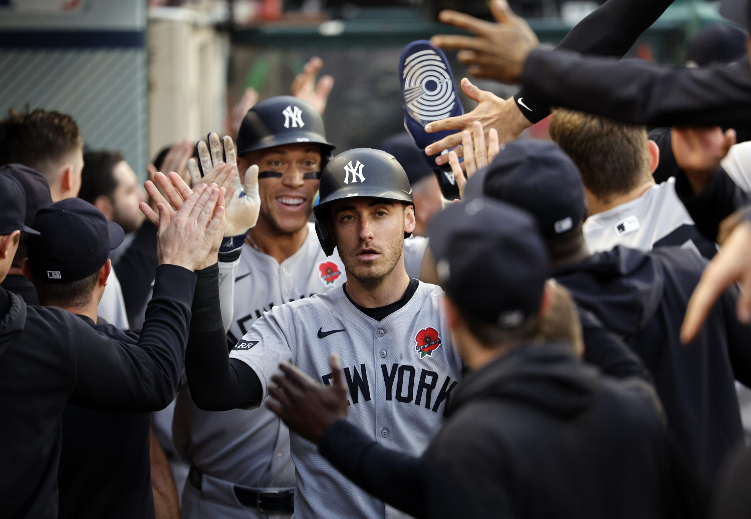 The New York Yankees’ Cody Bellinger, center right, and Aaron...