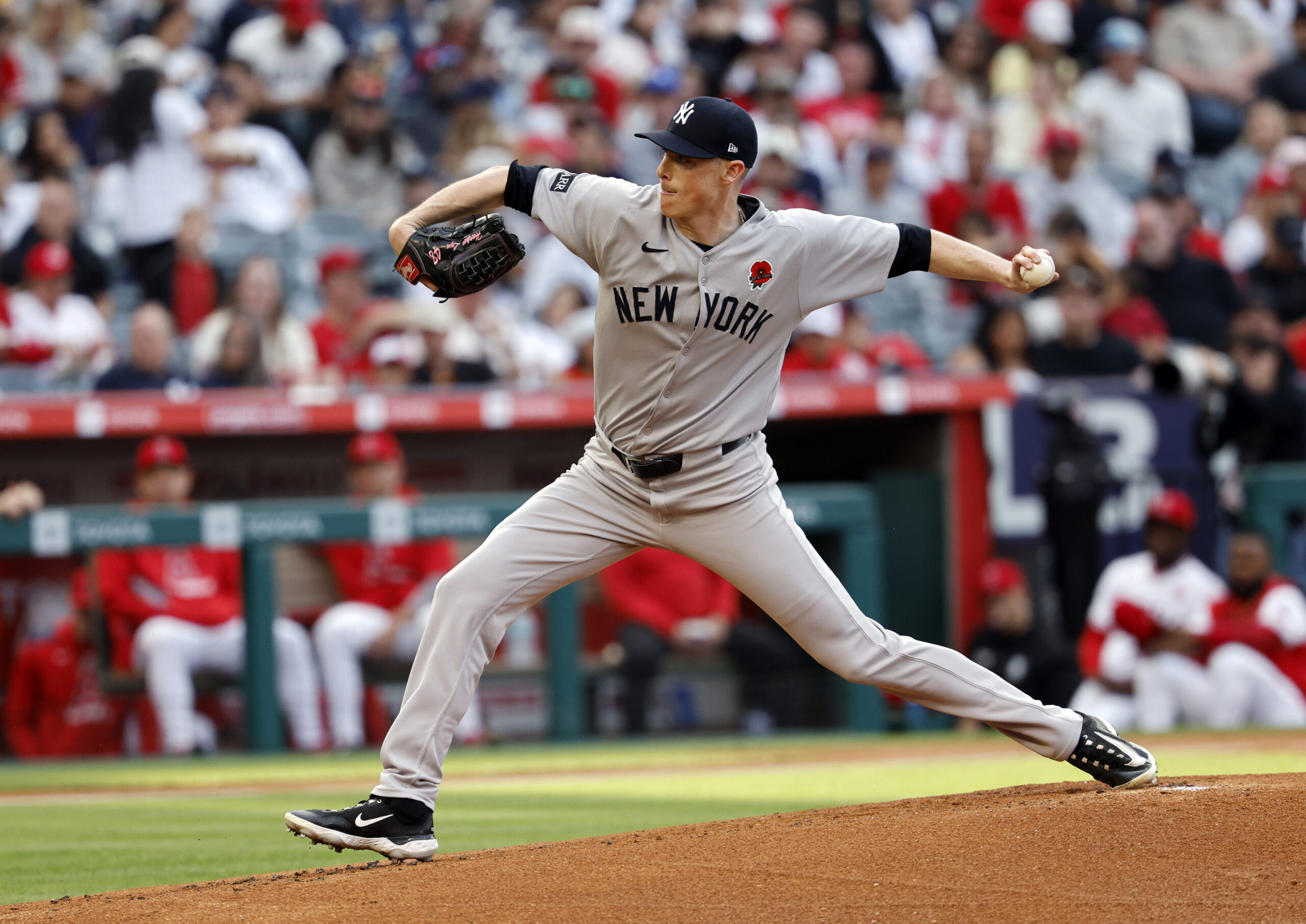 New York Yankees starting pitcher Ryan Yarbrough throws to the...