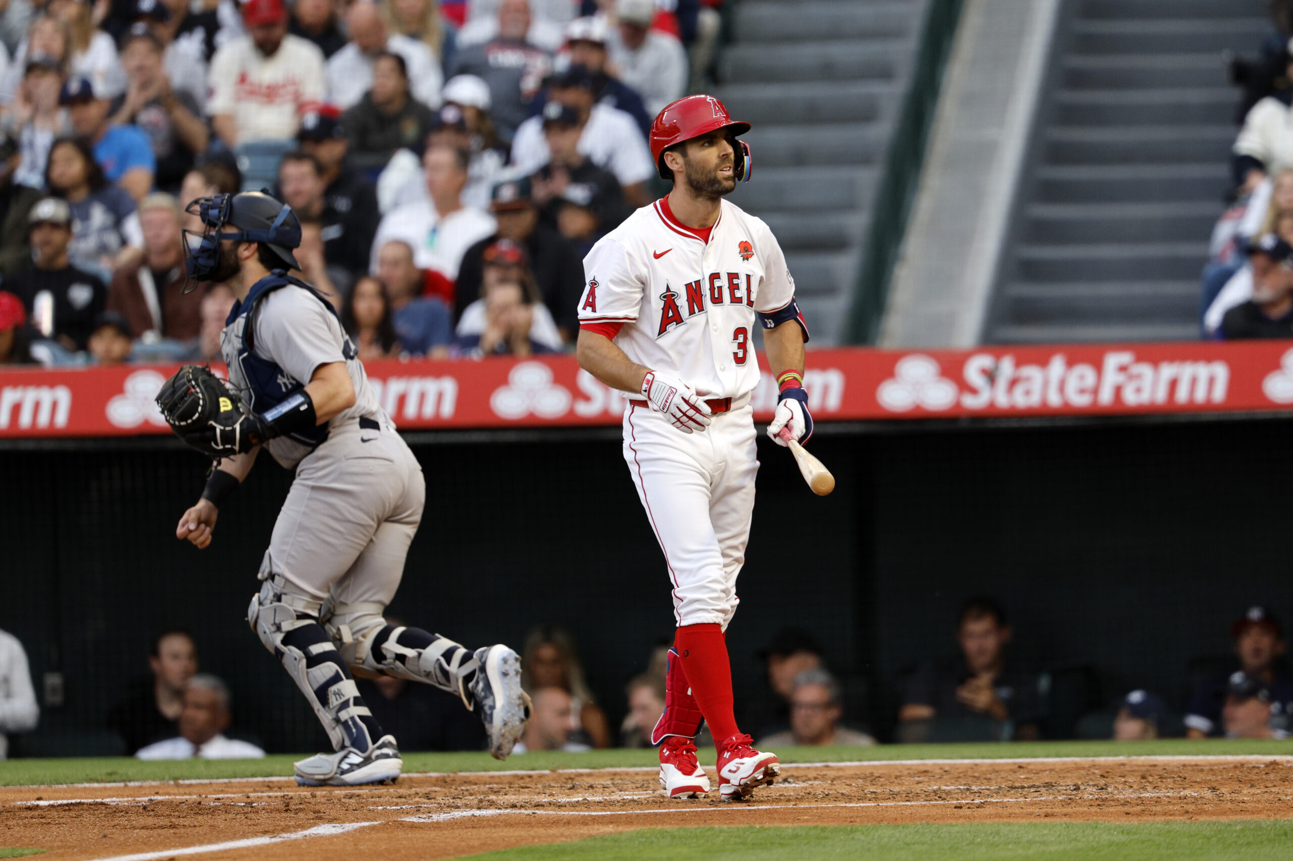 New Angels utility man Chris Taylor reacts after striking out...